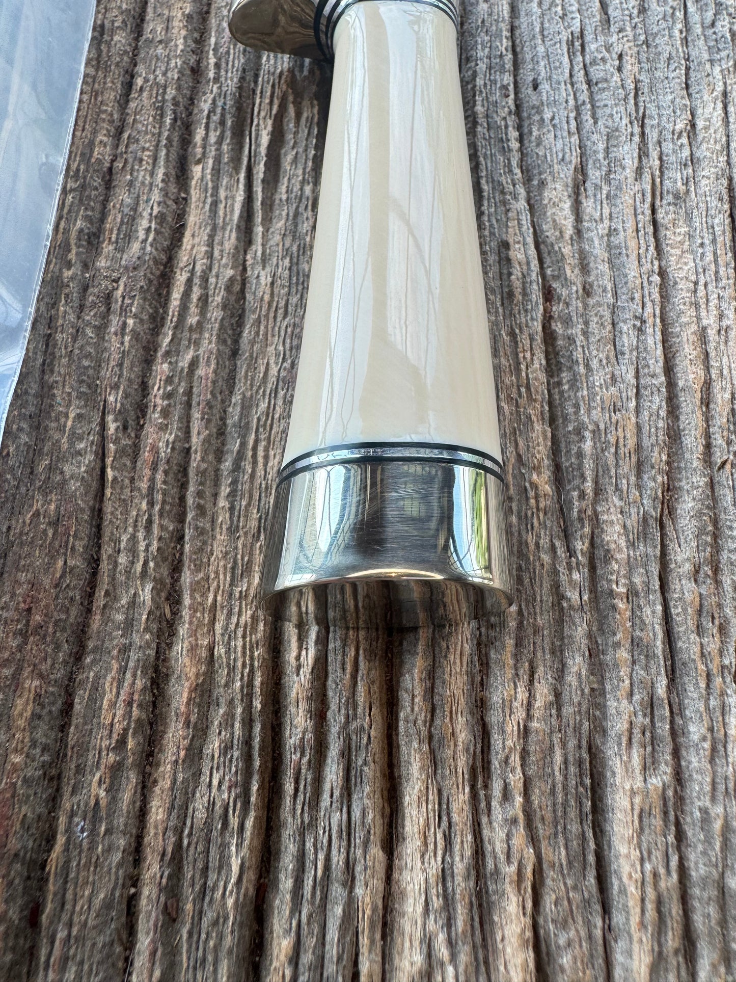 New in paper Randall Model 8-4 with a nice piece of customer supplied Dave Warthers Resin, Stainless Steel, Nickel Silver Single Hilt and butt cap.