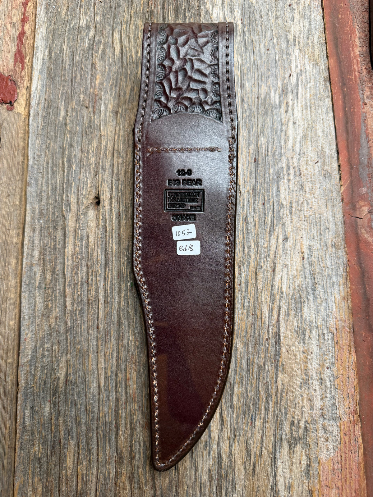 Randall Model 12-8 sheath with an Eastern Diamondback RattleSnake skin from Treeman Sheaths. Hand tooled belt loop, canteen snap. One of the hardest skins to source.