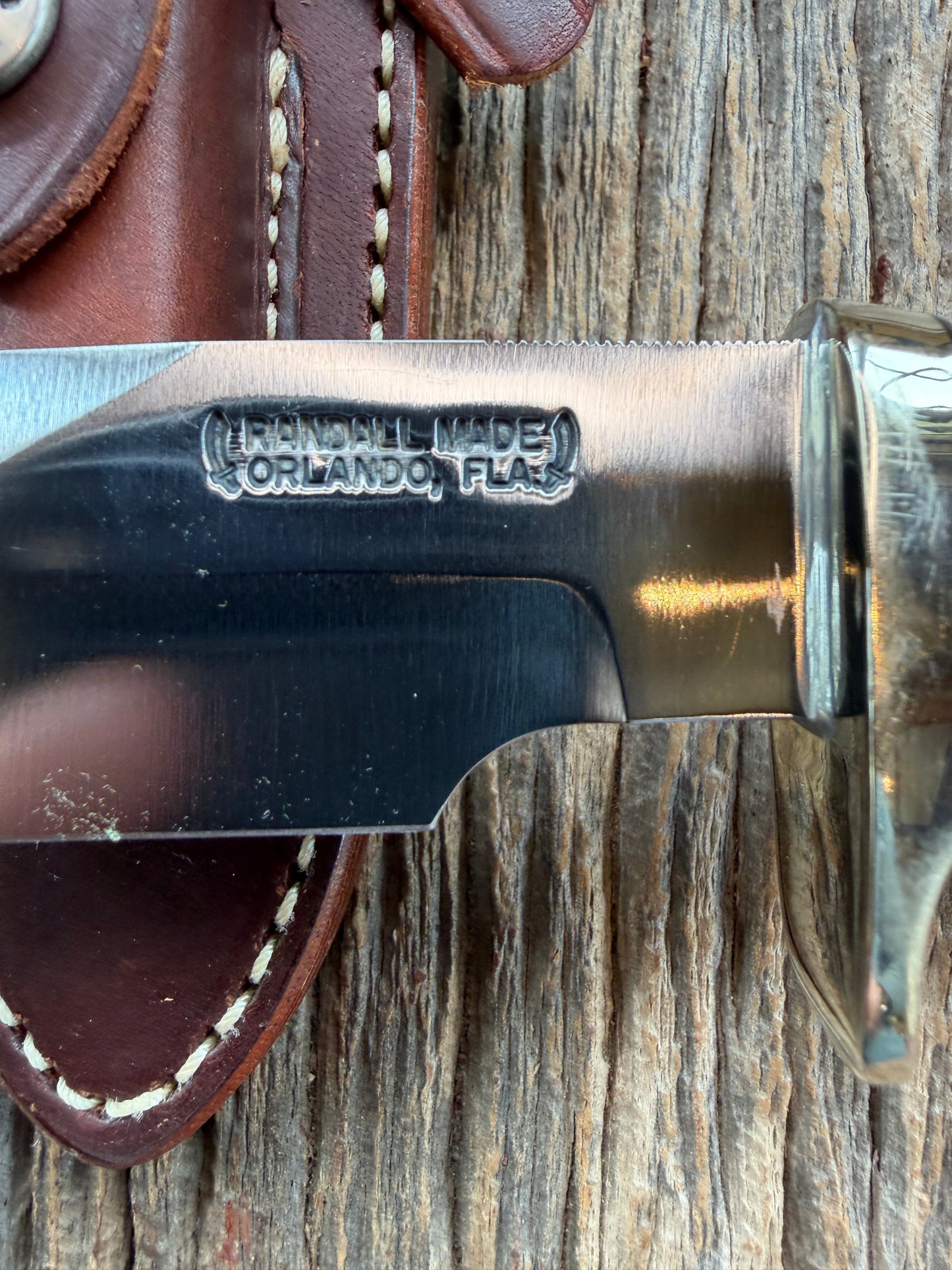 Randall Model Combat Companion with a nice piece of customer supplied Warthers Resin with finger grooves. Teeth, Nickel Silver Hilt and a raw natural end.