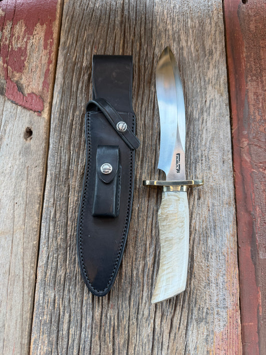 Randall Model 12-8 Small Sasquatch with a nice piece of Musk Ox. Nickel Silver collar and raw natural end.
