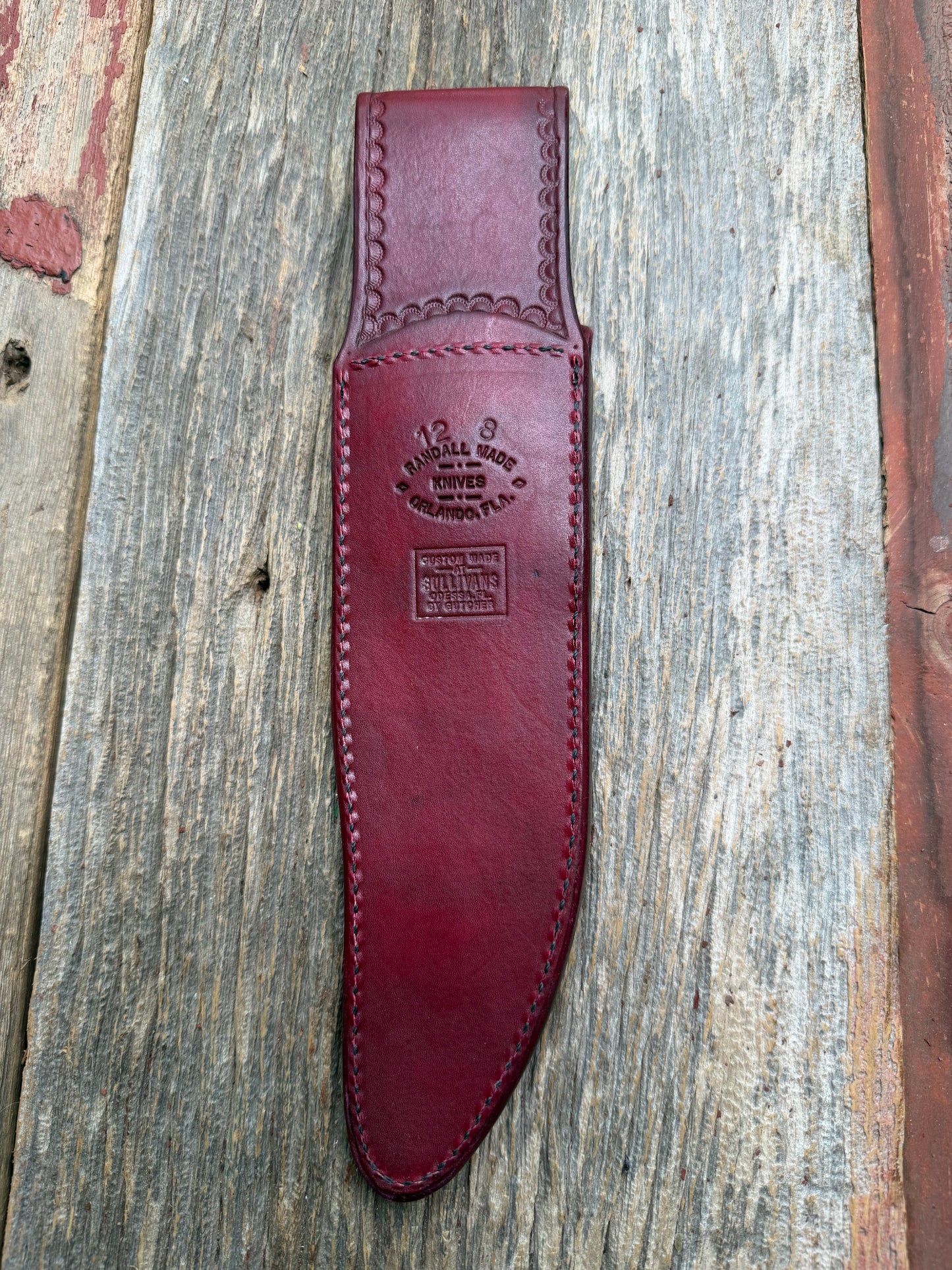 Randall Model 12-8 “Big Bear” sheath in Ox Blood Red stamped leather from Sullivans by Gutcher. Parquet window pattern, mesmerizing !!