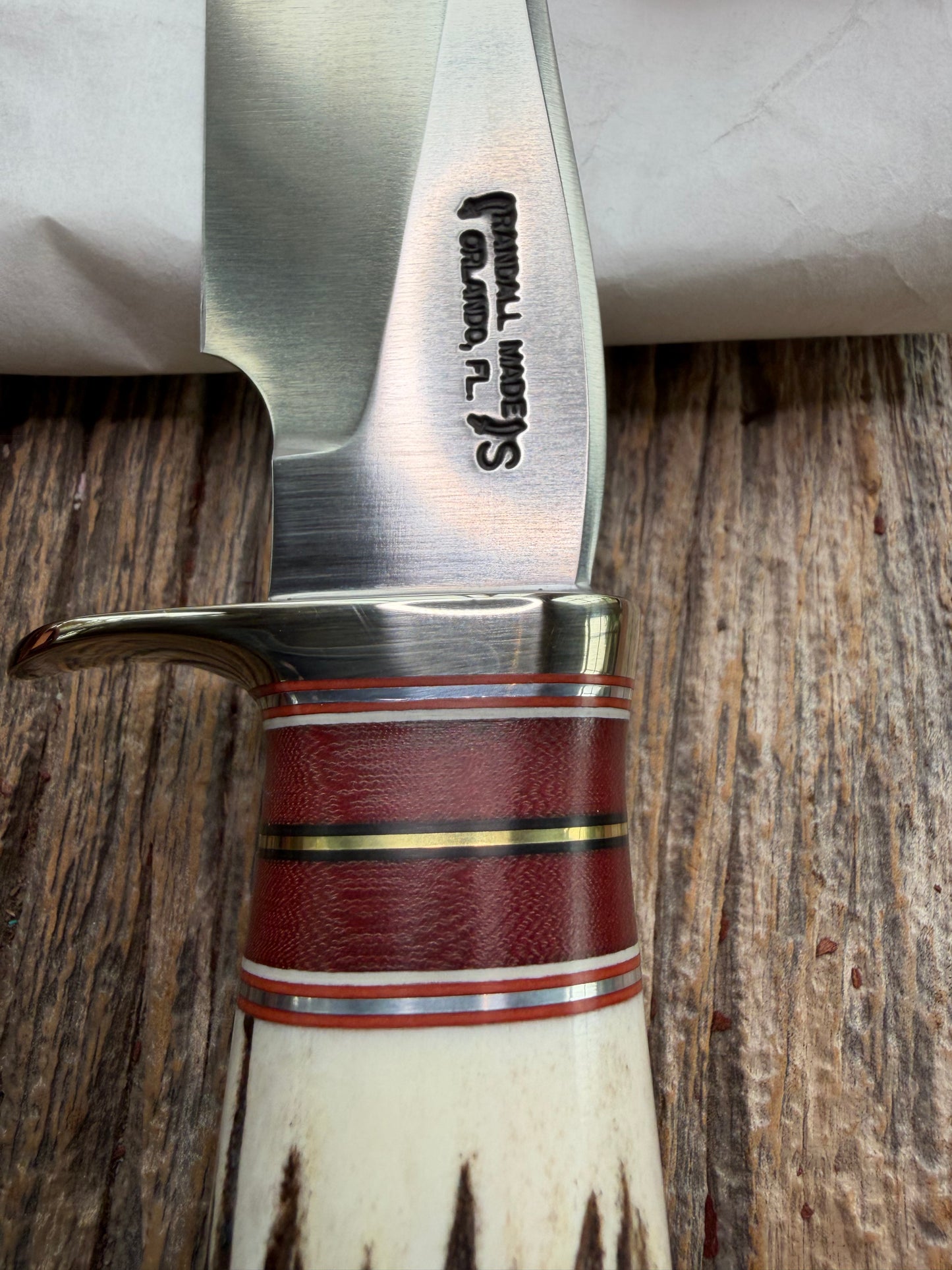 New in Paper Randall Made Knife Model 27-5 with a Stag handle, Stainless, Nickel silver single Hilt, red and aluminum spacers, loaded!!