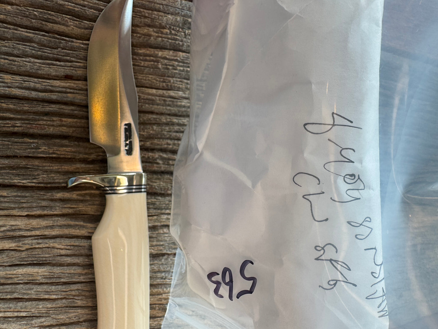 New in paper Randall Model 8-4 with a nice piece of customer supplied Dave Warthers Resin with a single finger grip. Stainless Steel, Nickel Silver Single Hilt and a raw natural end.