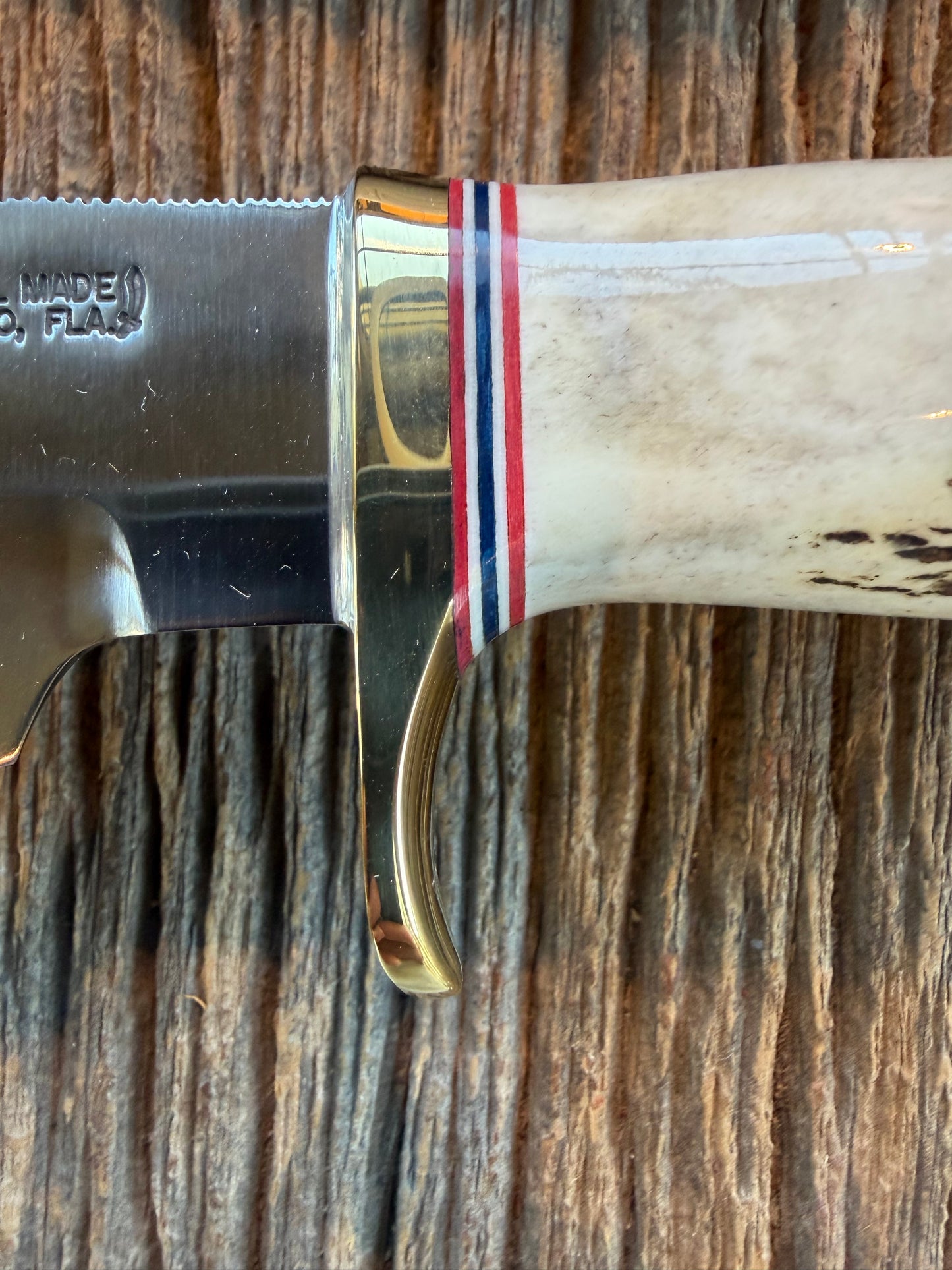 New in Paper Randall Model 19-5 Bushmaster with a Stag handle. Carbon blade, Nickel silver single hilt. Brown leather sheath.