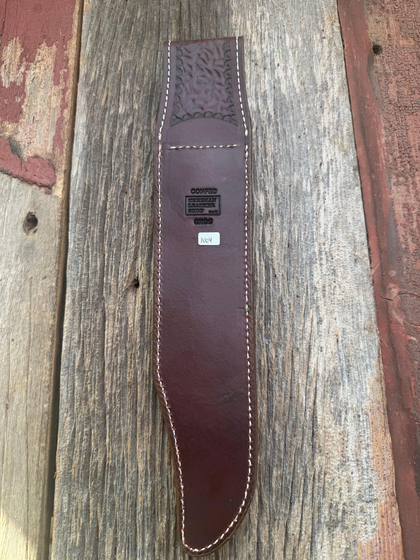 New Randall Model 12-11 Confederate Sheath in Exotic thick and textured Honey Crocodile skin ( Hornback) on brown leather from Treeman with a silver Canteen snap. Hand tooled belt loop. Killer sheath.