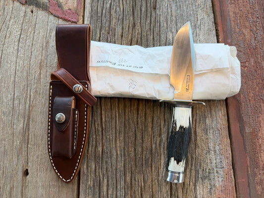 New in Paper Randall Non Catalog Model Sergeants Special. Nice Stag handle, Stainless blade, Nickel silver hilt and durillium butt cap. Brown leather sheath.