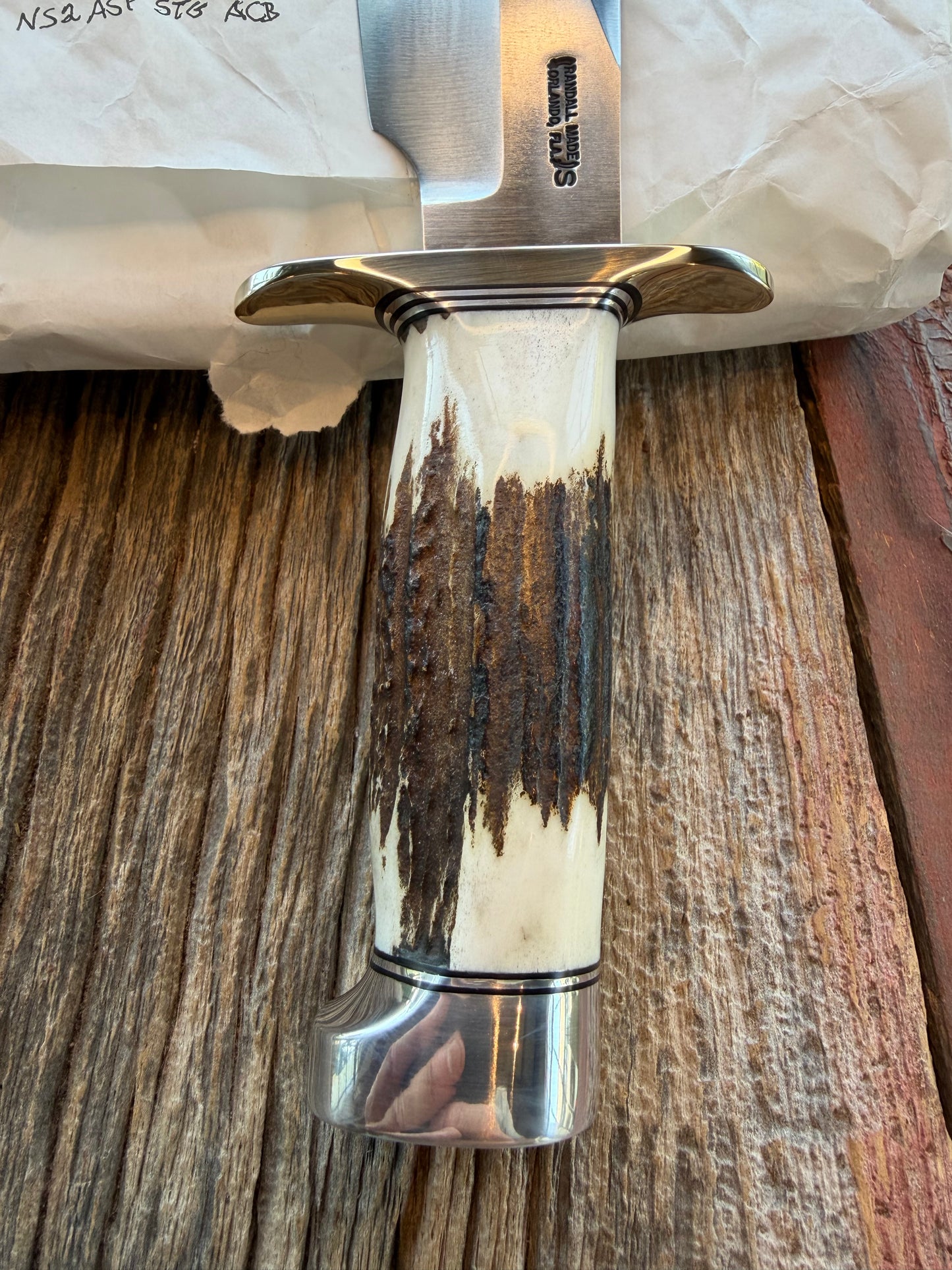 New in Paper Randall Model 19-5 with a Gnarly piece of Stag. Nickel silver Hilt and Aluminum crows beak Butt cap.