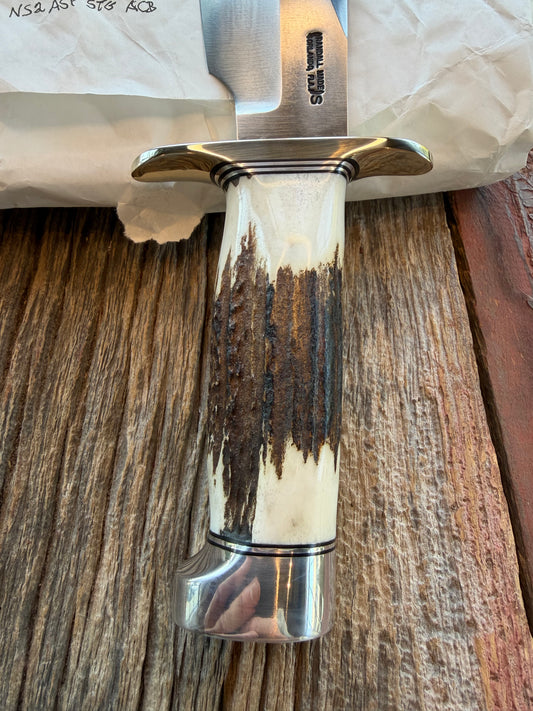 New in Paper Randall Model 19-5 with a Gnarly piece of Stag. Nickel silver Hilt and Aluminum crows beak Butt cap.