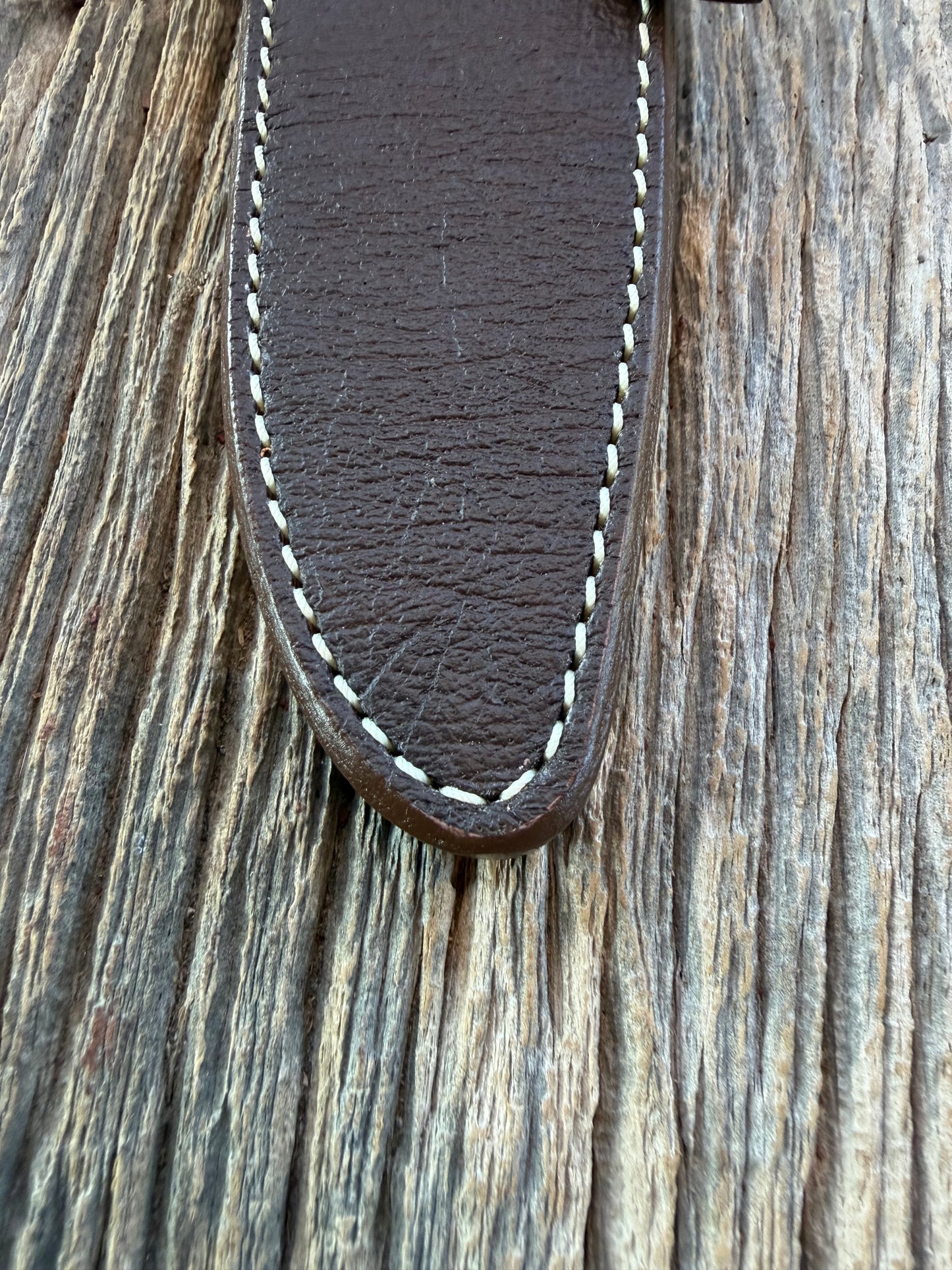 New Randall Model 25-5 Sheath in Exotic Brown Cape Buffalo with full leather hand tooled belt loop. Randall snap and stamp on the back. Custom Made at Sullivan’s by Gutcher