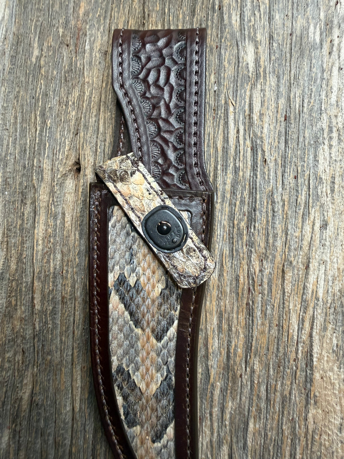 Randall Model 27 sheath with a Canebrake RattleSnake skin from Treeman Sheaths. Vibrant colors and along side Copperheads the hardest skin to source.