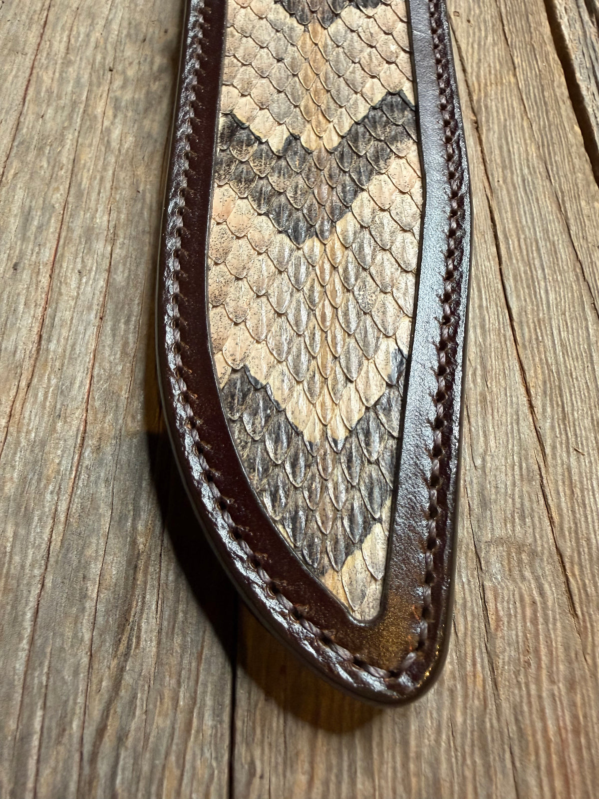 Randall Model 14 sheath with a Canebrake RattleSnake skin from Treeman Sheaths. Vibrant colors and along side Copperheads the hardest skin to source.