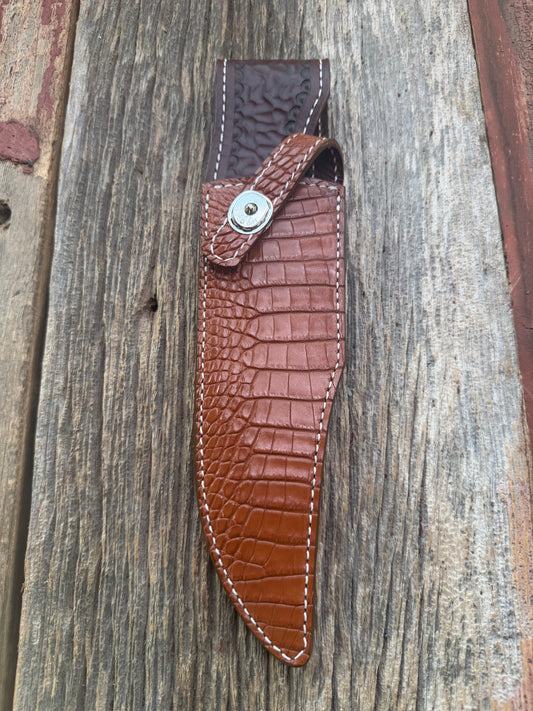 New Randall Model 12-8 Big Bear Sheath in Exotic thick and textured Honey Crocodile skin on brown leather from Treeman with a silver Canteen snap. Hand tooled belt loop. Killer sheath.