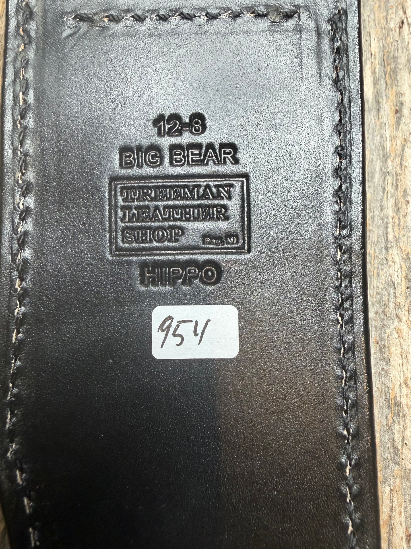 Randall Model 12-8 “Big Bear” in Black Hippo, forward curved hilt, black Canteen Snap, full brass stamping and stitching.