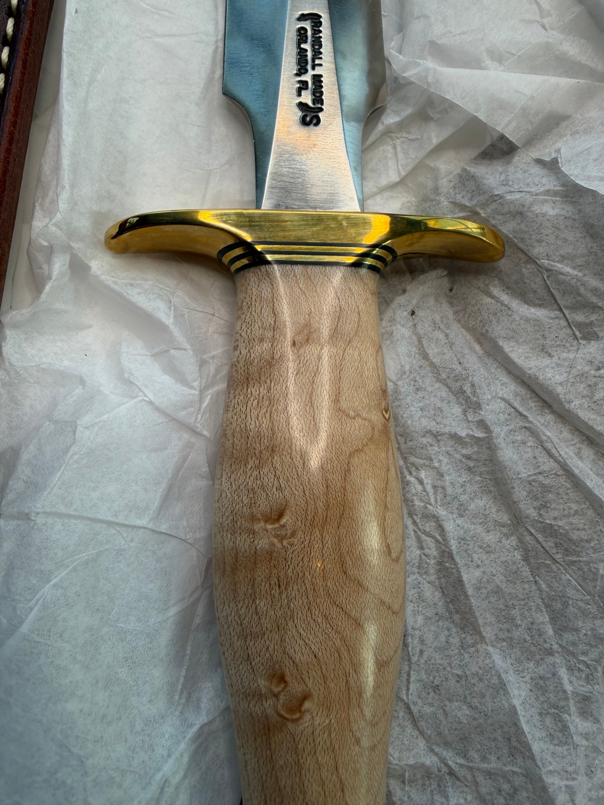 New in Paper Randall Made Knife Model 2-7 Maple wood, Stainless, Black and gold spacers, Brass Hilt and  butt cap.