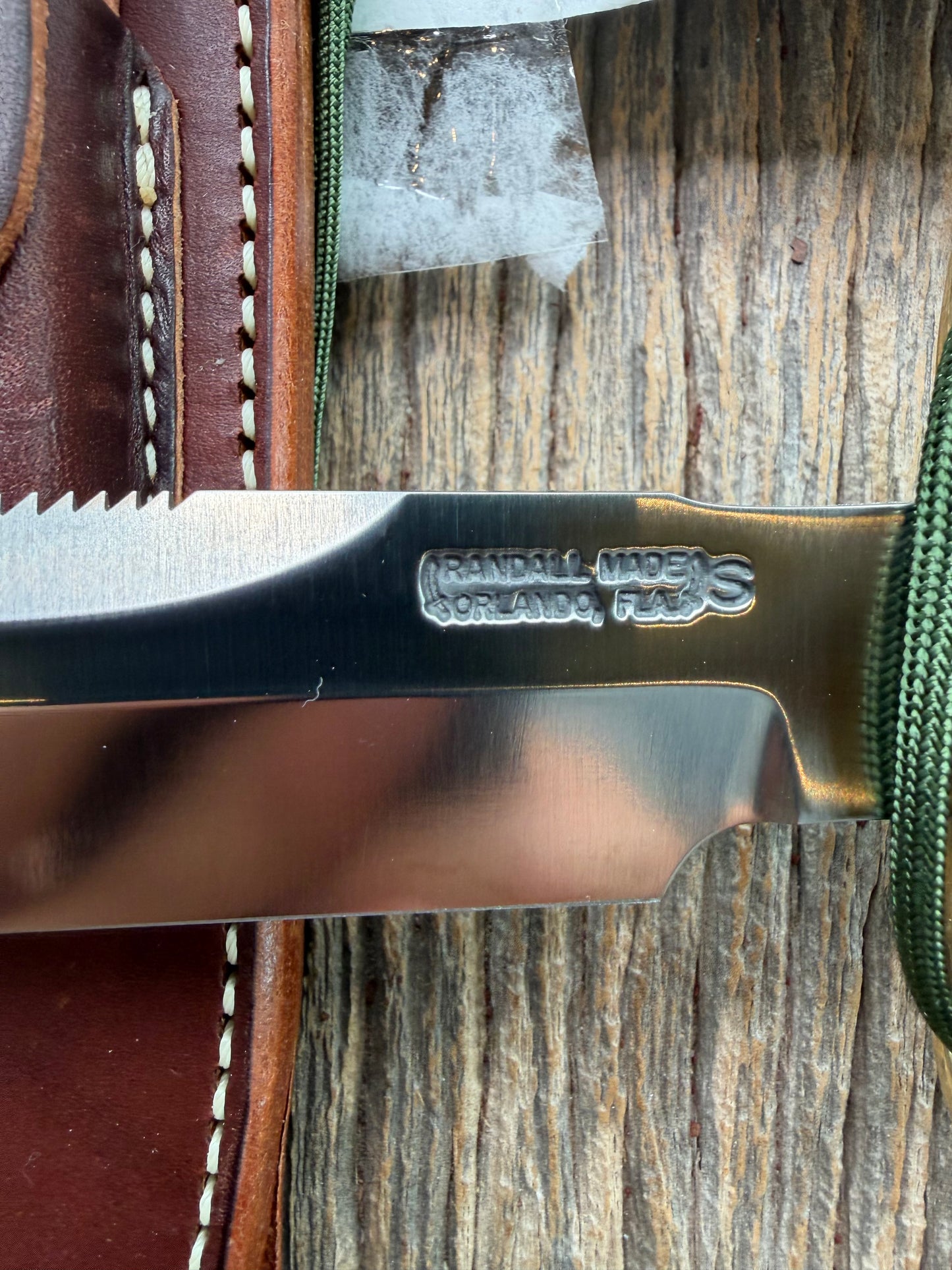 New in Paper Randall Made Knife Model 1-7 Green Micarta handle, Stainless, brass Double Hilt, Brass Crows beak butt cap, lanyard, Sawteeth, single black spacer…loaded!!
