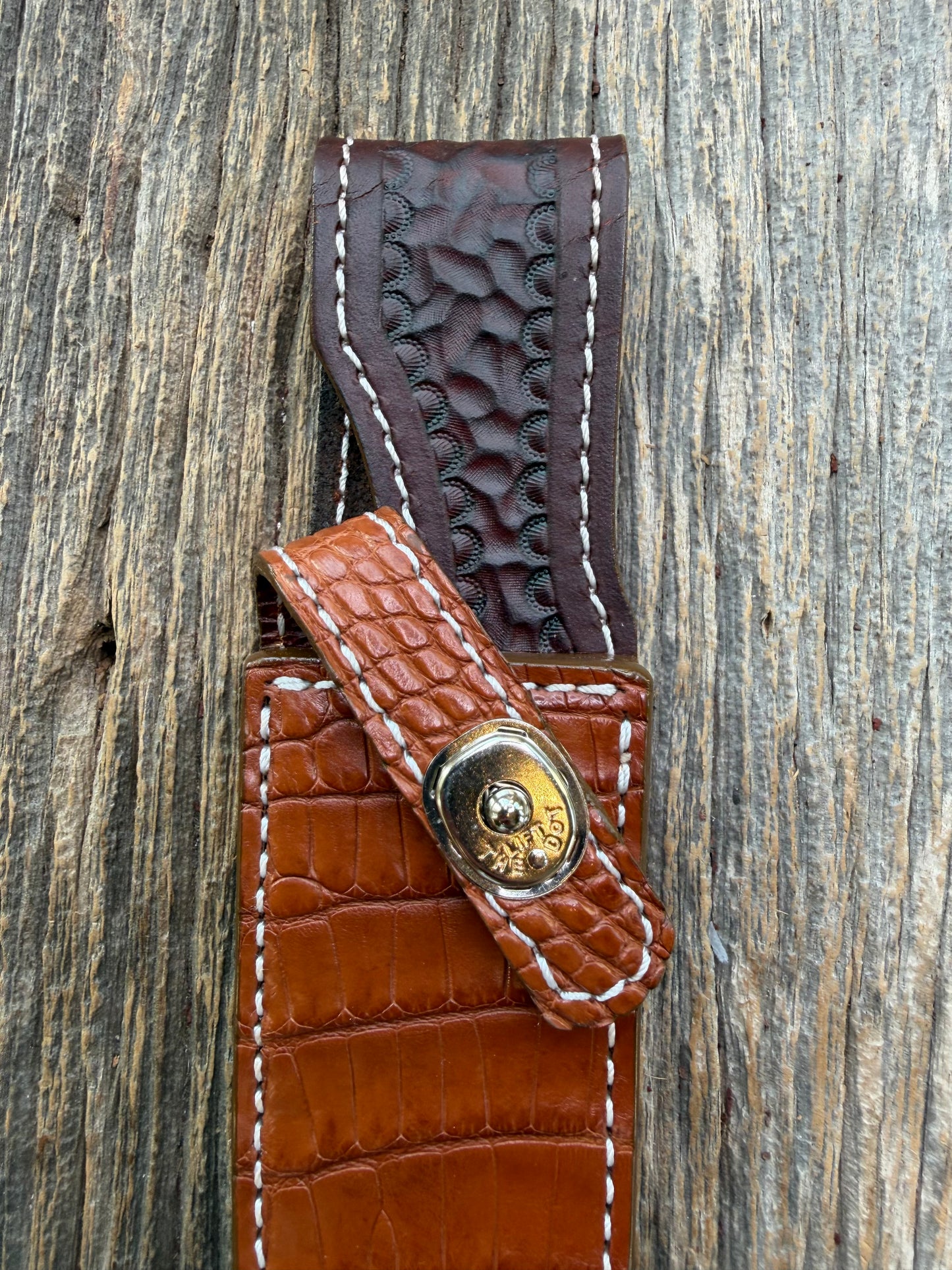 New Randall Model 23 Sheath in Exotic thick and textured Honey Crocodile skin on brown leather from Treeman with a silver Canteen snap. Hand tooled belt loop. Killer sheath.