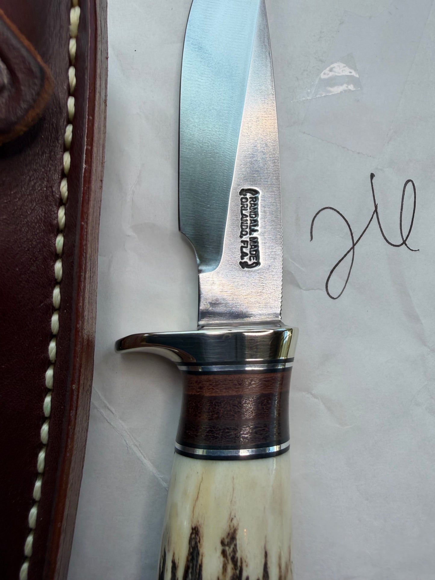 New in paper Randall Knife Model 26 Pathfinder. Stag, Black and Aluminum and leather spacers, Lanyard, NSH and buttcap.