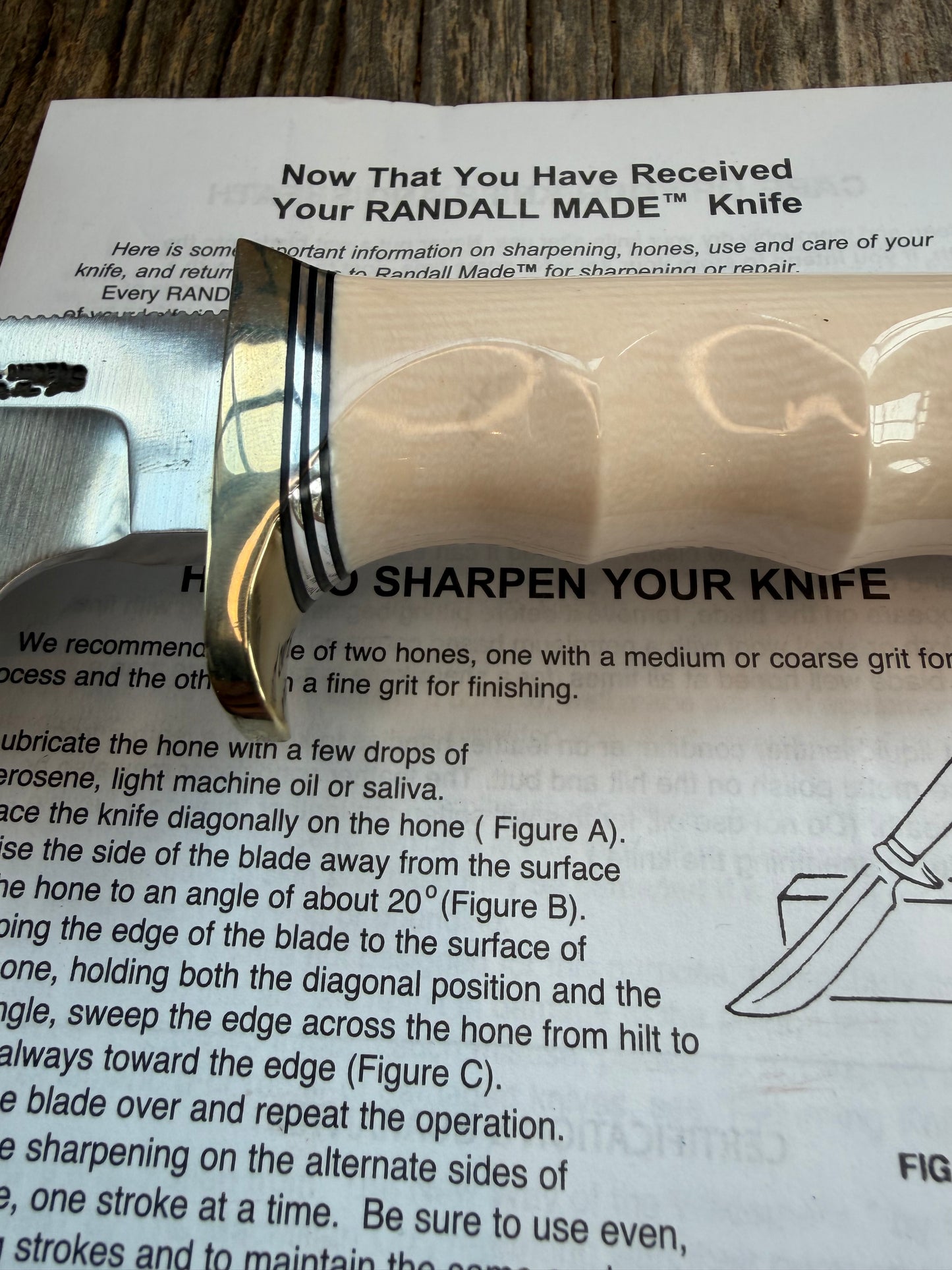 New Randall Model Bowles Skinner # 504 with a Warthers Resin finger grooves handle. Nickel silver Single Hilt and natural end with a compass.
