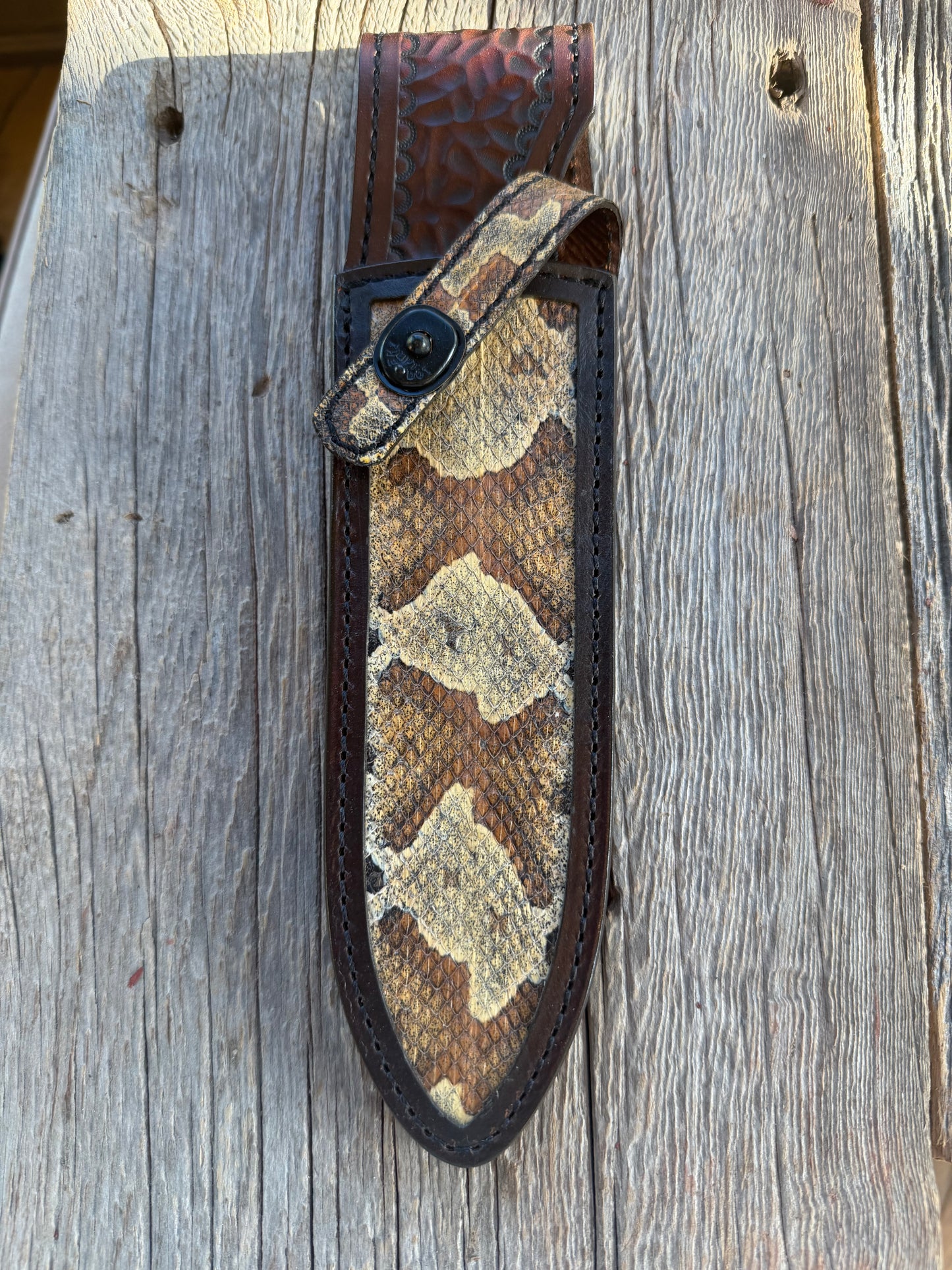 New Randall Model Clinton Special Sheath in Exotic Southern Copperhead from Treeman Sheaths. Black Canteen Snap. Stunning colors and pattern. Very rare skin.