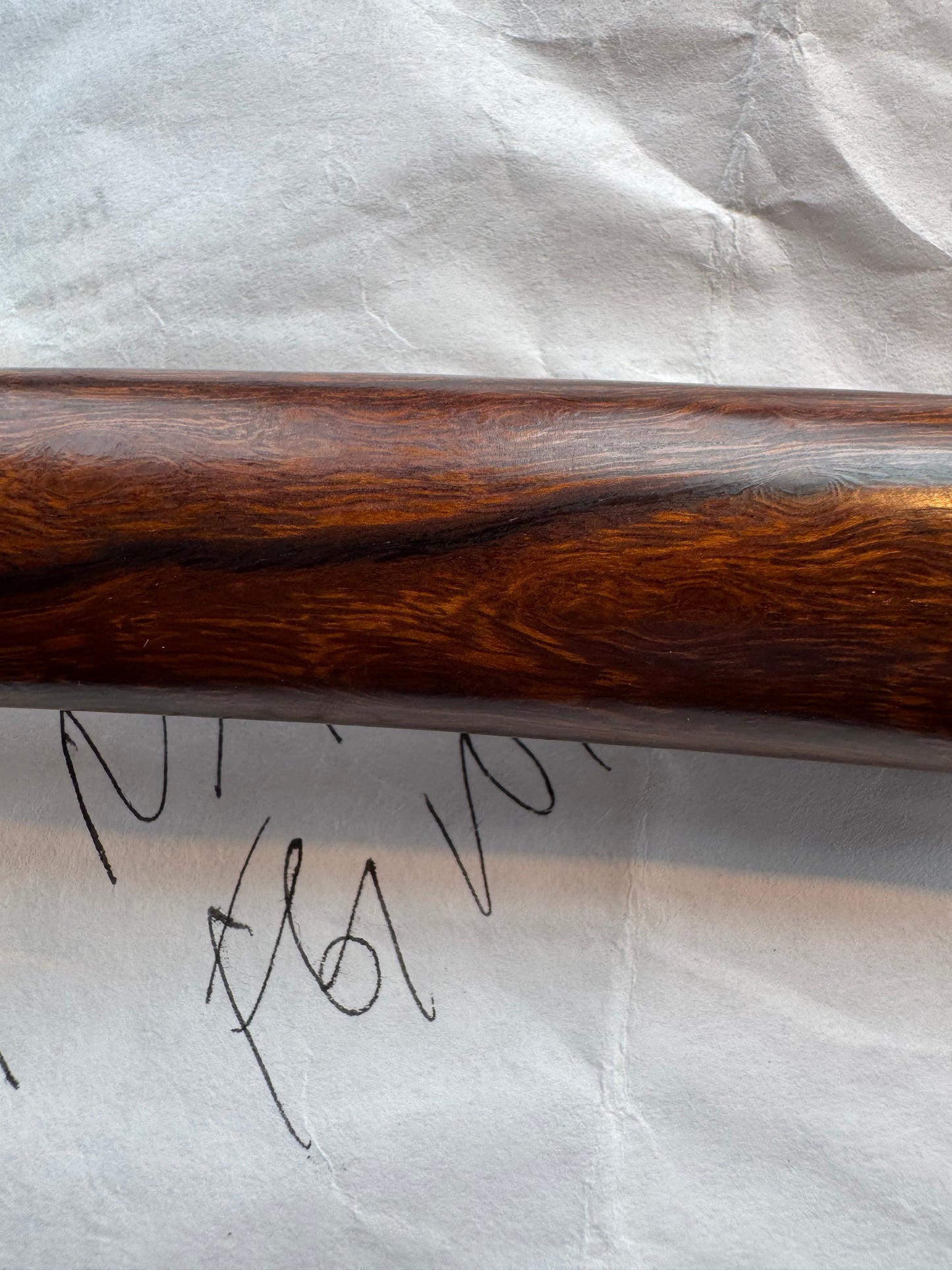 New in Paper Randall Model 1-7 Stainless steel blade, Nickel silver hilt and butt cap. Brown leather sheath. Burl wood handle.