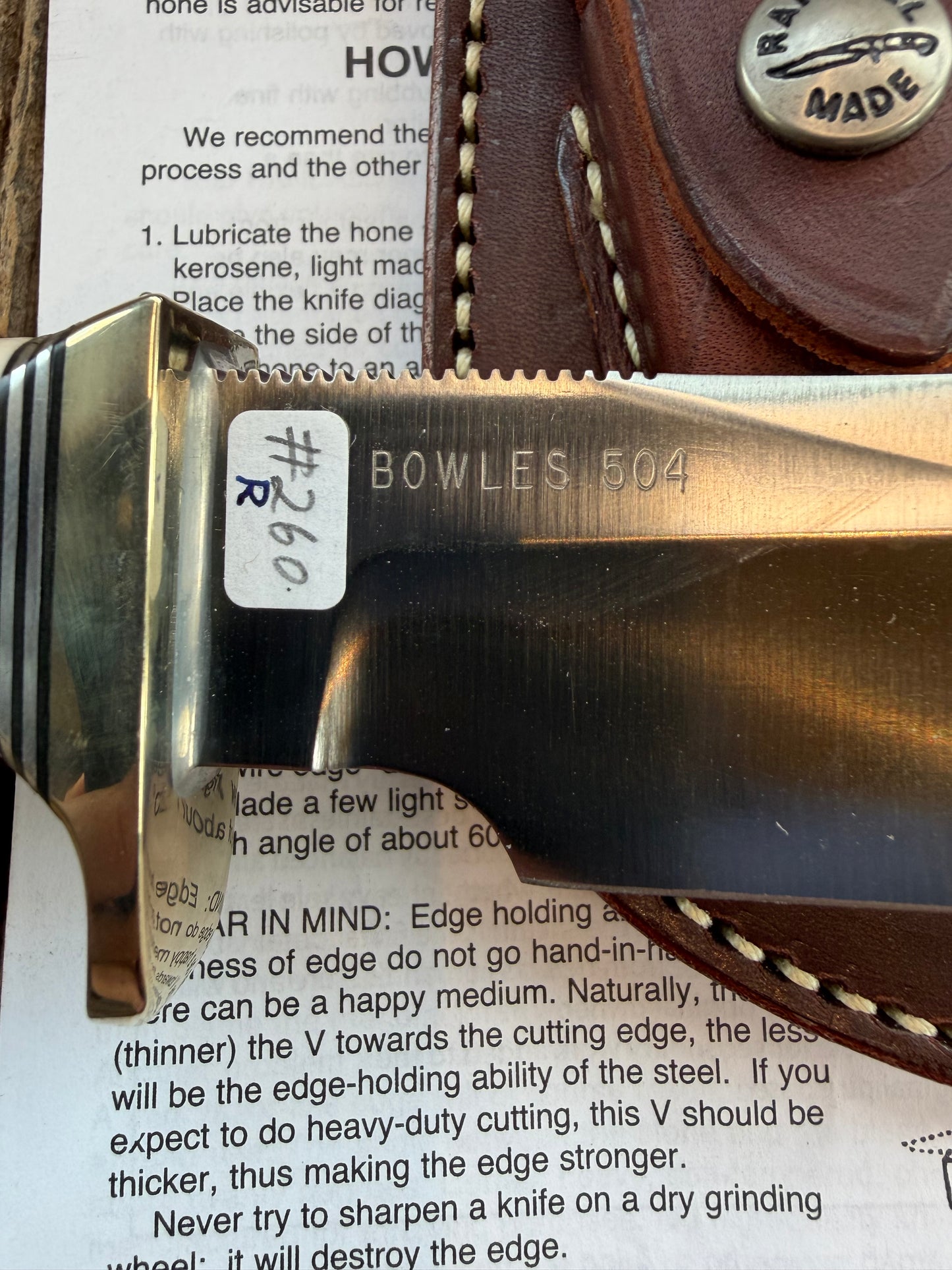 New Randall Model Bowles Skinner # 504 with a Warthers Resin finger grooves handle. Nickel silver Single Hilt and natural end with a compass.