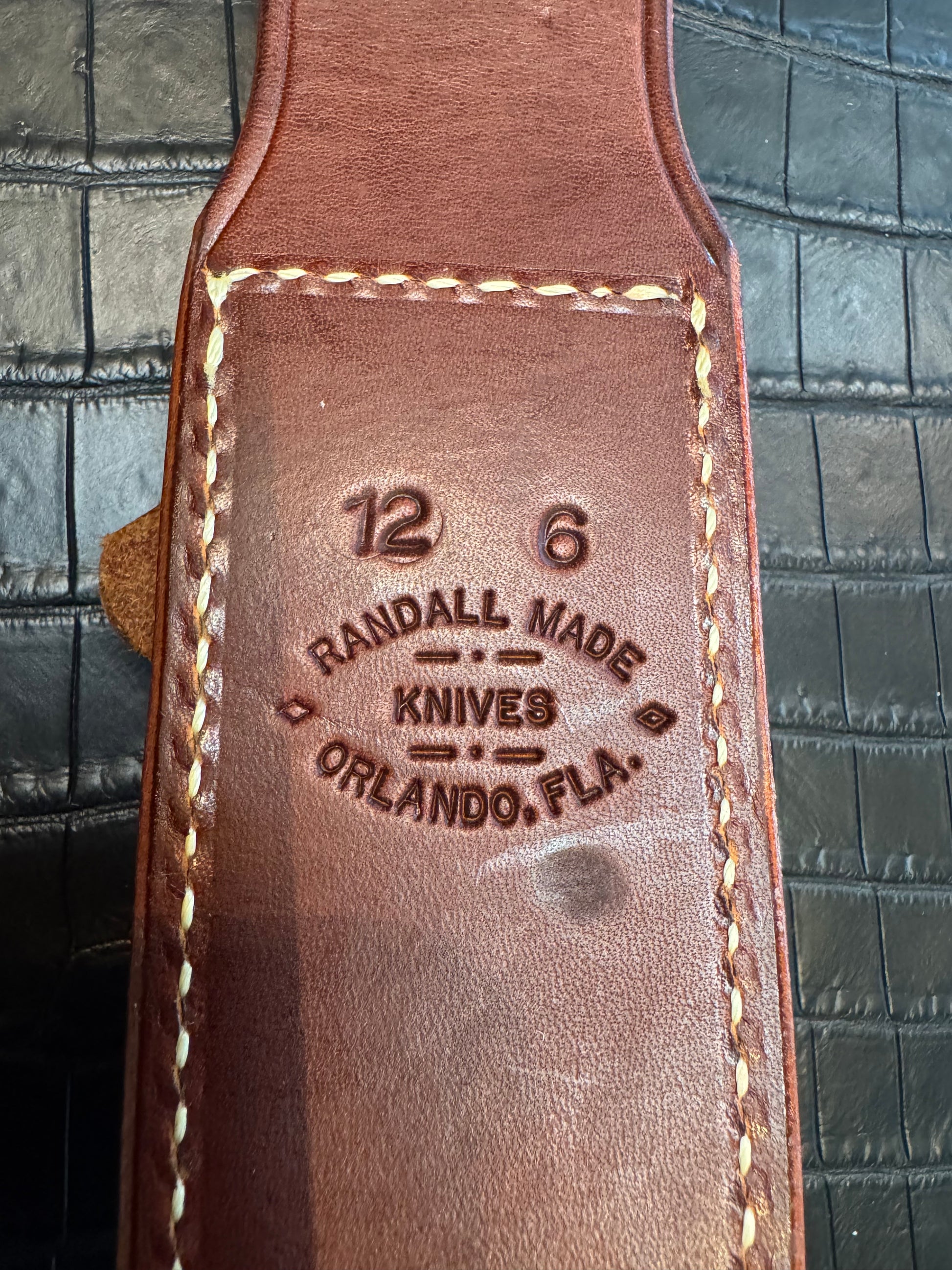 New unused Randall Model 12-6 “Little Bear” Sheath in Brown Leather made at Sullivans by Gutcher in Tampa Florida. Official sheath maker for Randall Knives.