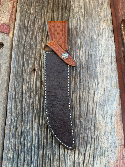 New Randall Model 4-7 Sheath in Exotic Brown Cape Buffalo with full leather hand tooled belt loop. Randall snap and stamp on the back. Custom Made at Sullivan’s by Gutcher