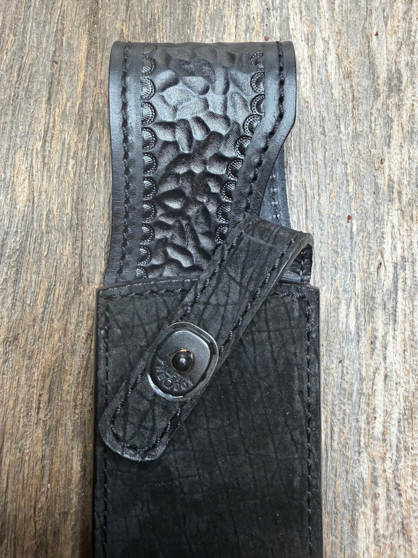 Randall Model 12-9 in Black Hippo, forward curved hilt, black Canteen Snap, full brass stamping and stitching.