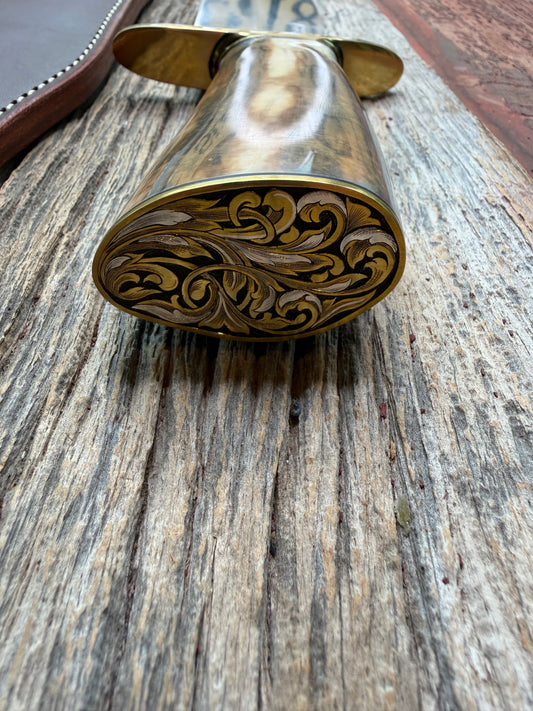 Randall Model 12-11 Smithsonian “Smitty” in a Huge piece of Green, Brown and Blue Fossil Walrus Ivory. Brass Hilt and Brass Butt plate fully engraved in Silver from Jere Davidson.  Stunning piece.