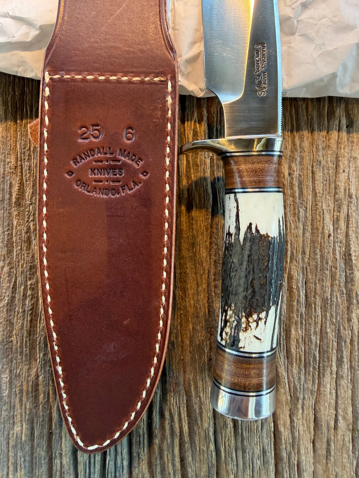 New in paper Randall Knife Model 25-6 Trapper in Stag Leather Handle Stainless Blade, NSH