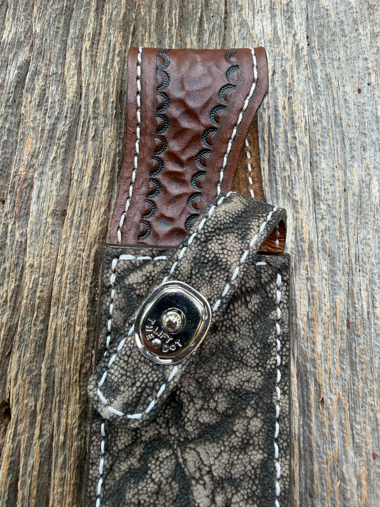 New Randall Model 1-8 Sheath in Exotic thick and textured Black and Grey Elephant Ear  on brown leather from Treeman with a silver Canteen snap. Hand tooled belt loop. Killer sheath.