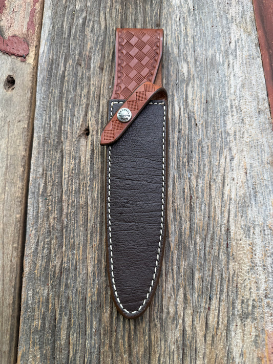 Pristine Randall Model 2-7 sheath in Exotic Cape Buffalo leather from Sullivans by Gutcher. Heavily tooled belt loop and strap. Randall snap and clean stamping on the back … perfect!!