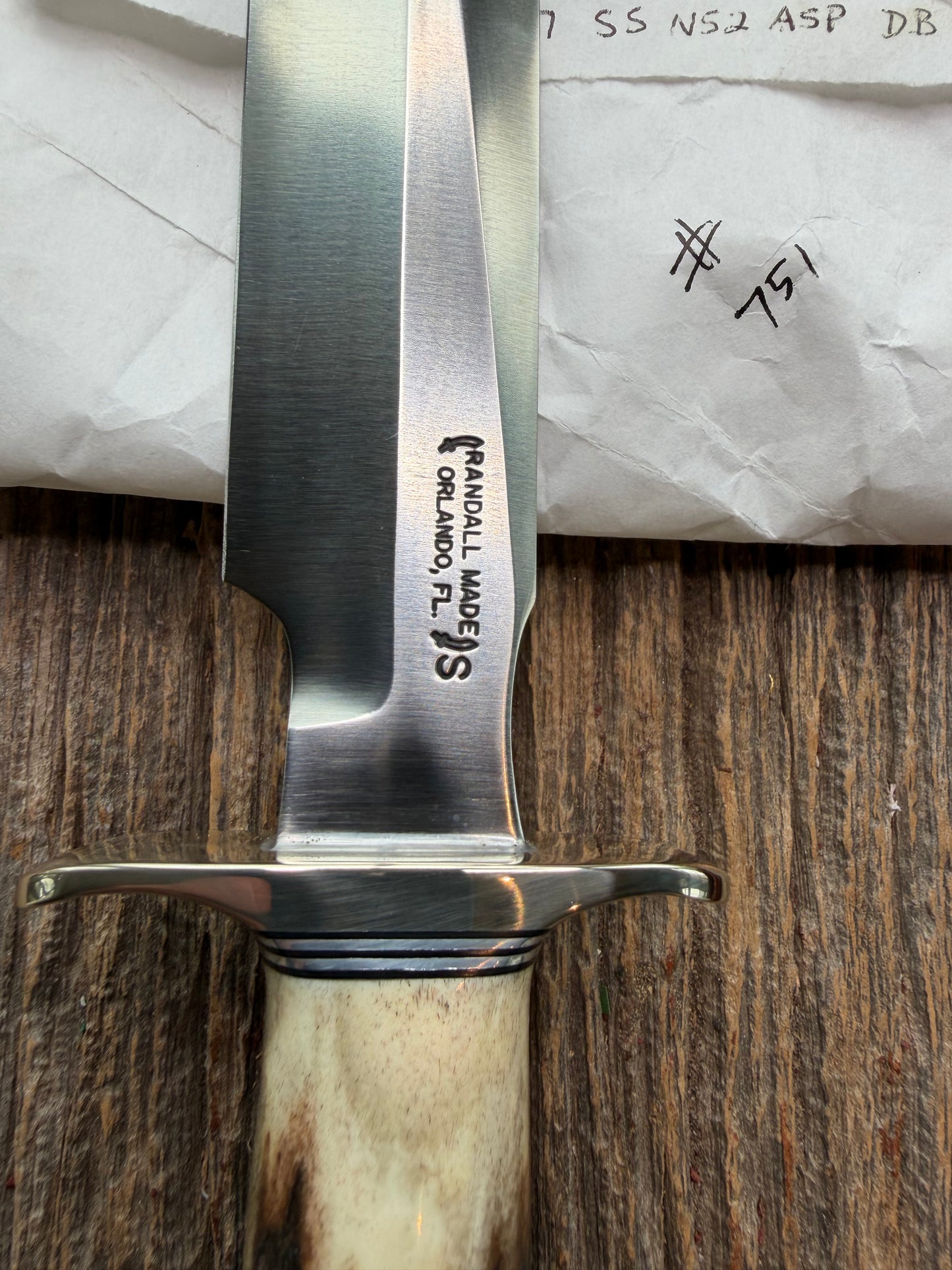 New in Paper Randall Made Knife Model 1-7 Darkened Stag , Stainless, Black and Aluminum spacers, Nickel Silver Hilt, Aluminum butt cap.