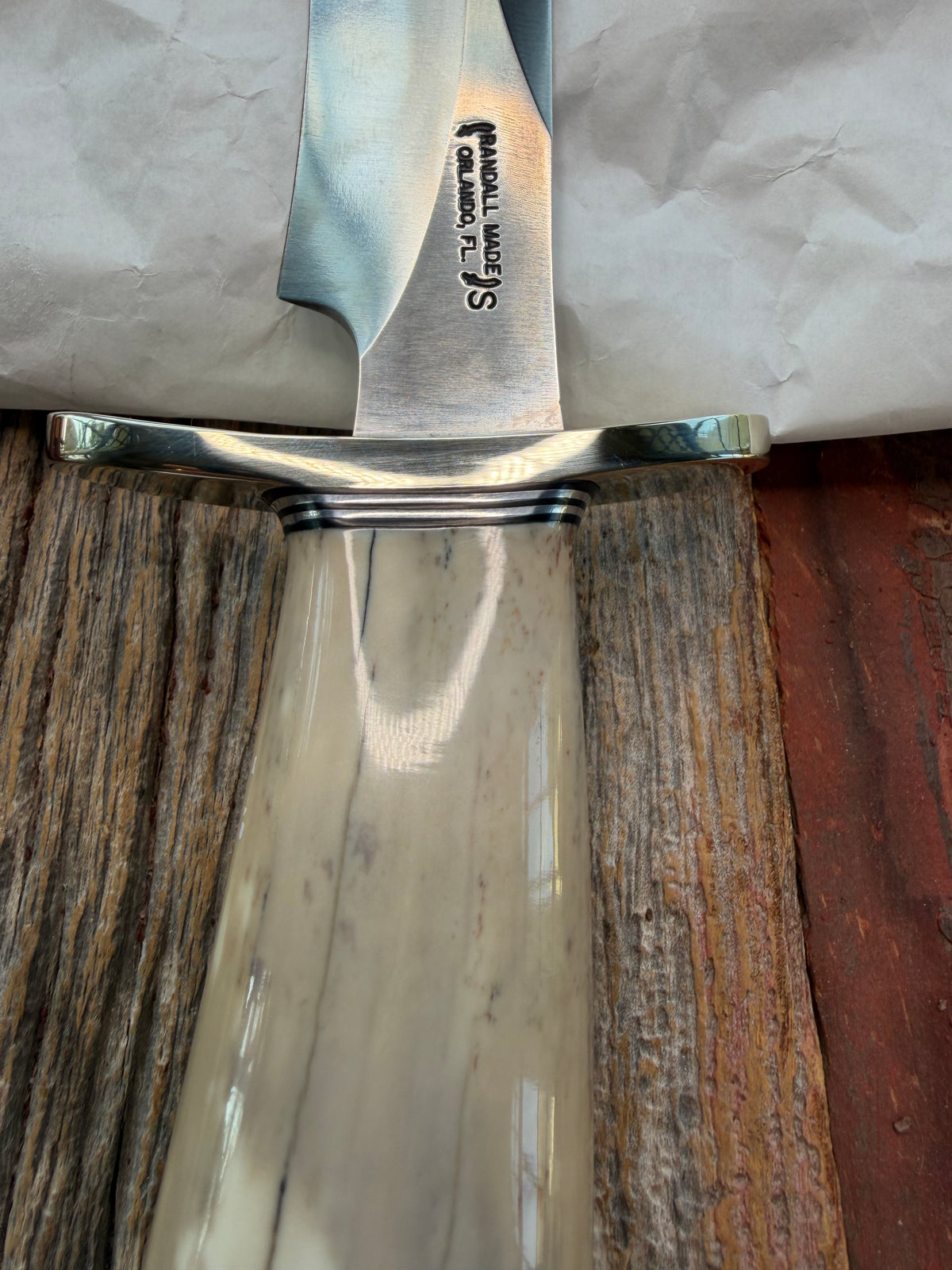 New in Paper Randall Model 12-8 Small Sasquatch with a nice piece of Fossil Walrus Ivory, Nickel Silver Hilt and butt plate.