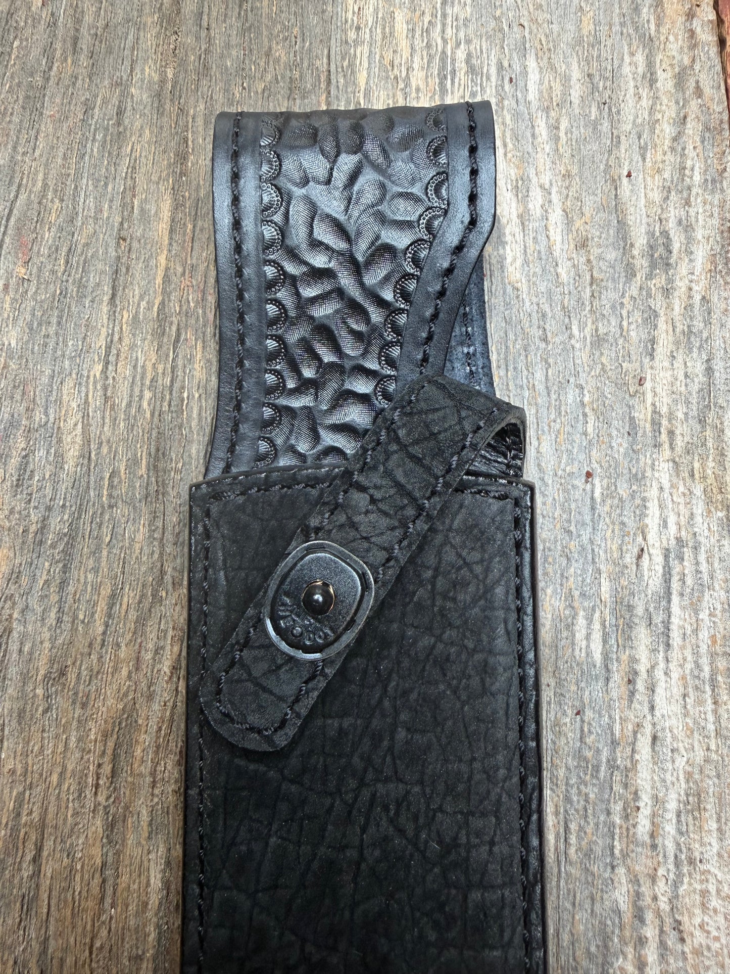 Randall Model 12-9 in Black Hippo, forward curved hilt, black Canteen Snap, full brass stamping and stitching.