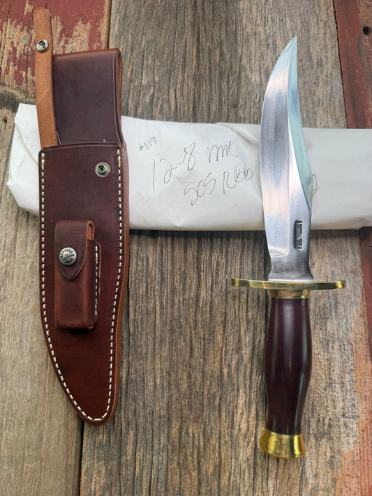 New in Paper Randall Model 12-8 Big Bear with a Maroon Micarta handle. Brass Hilt  and Brass collar, Carbon steel, brass butt cap.
