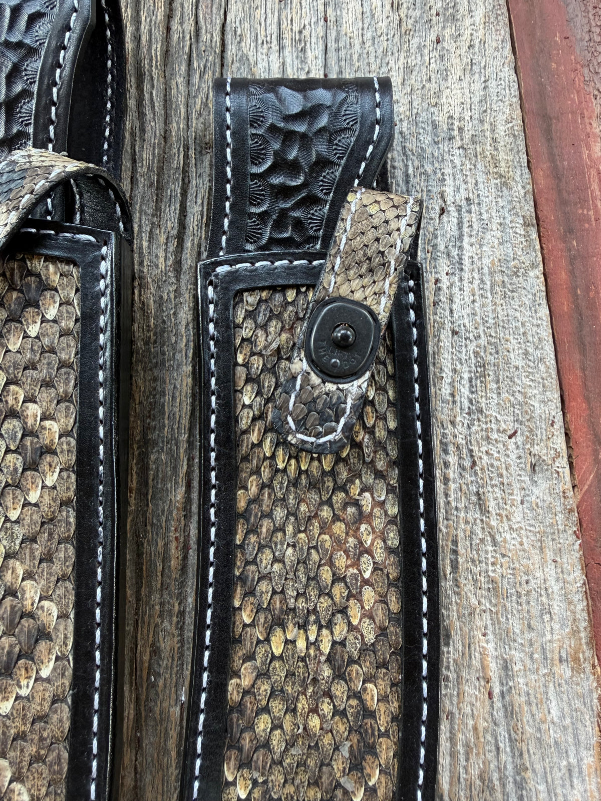 Randall Model Large Sasquatch and Small Sasquatch sheath pair with inlayed Western Diamondback RattleSnake skins from Treeman Sheaths. Very dark skins on brown leather, white deviated stitching and black canteen snaps.