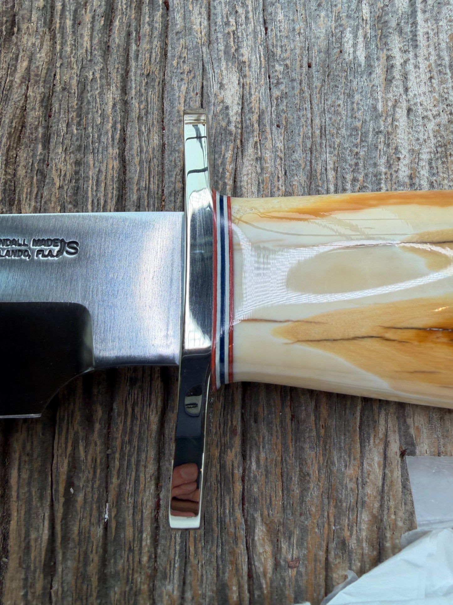 New in Paper Randall Knife Model 12-9 beautiful Fossil walrus handle, incredible colors (creams, browns , oranges) Double Nickel Silver hilt, nickel plate, Stainless Steel, RWB spacers