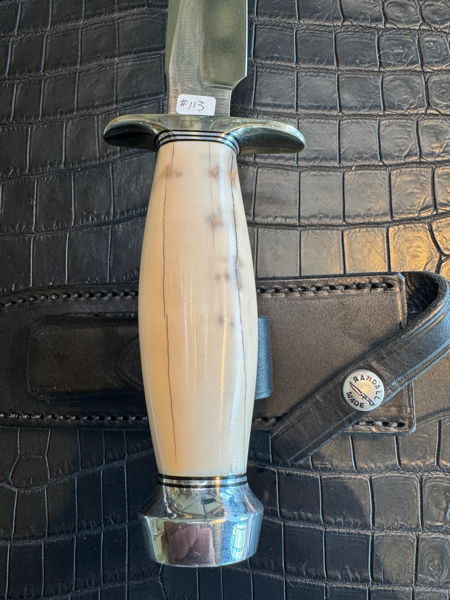 Randall Model 1-7 in Creamy Fossil Walrus Ivory. Nickel Silver Hilt and Aluminum Flanged Butt cap. ( slight crack)
