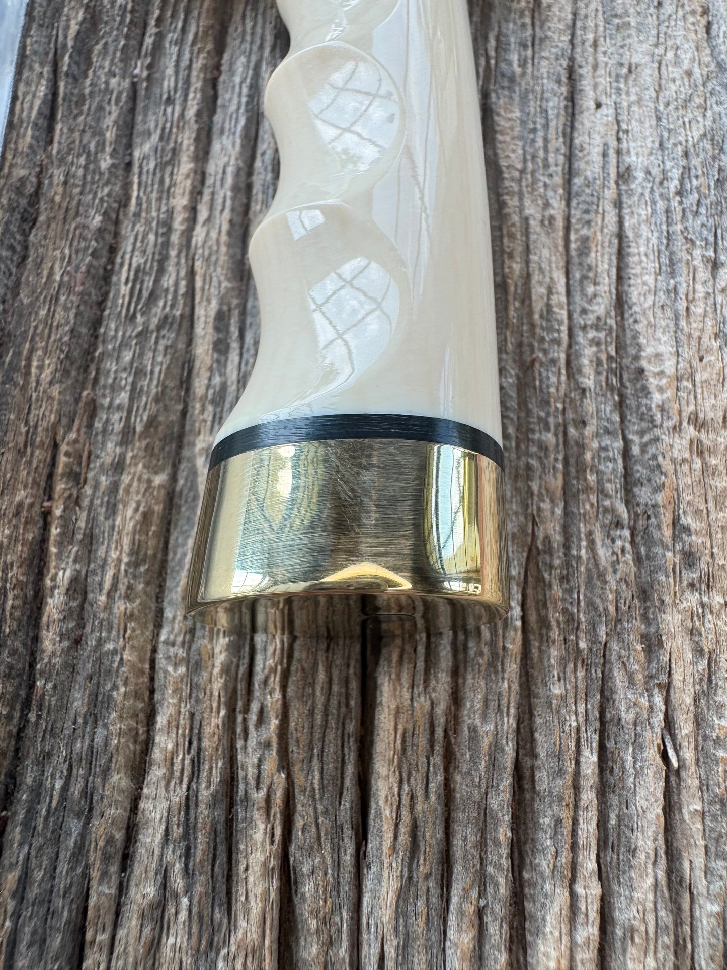 New in paper Randall Model Combat Companion with a nice piece of customer supplied Warthers Resin with finger grooves. Teeth, Stainless Steel, Brass Hilt and brass butt cap.