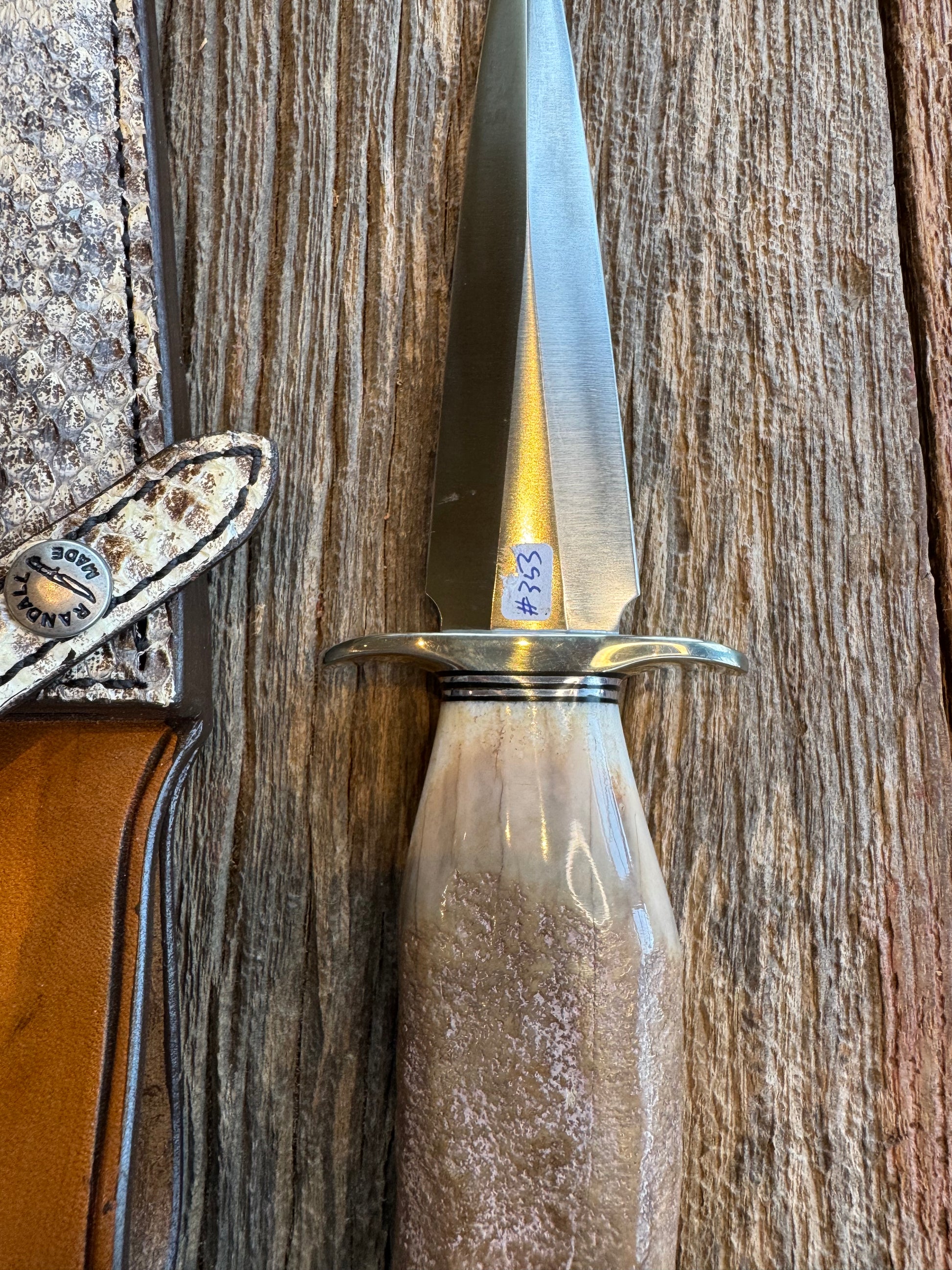 Randall Knife Model 13-6 Small Arkansas Toothpick Artifact. Fossil Walrus in an Ice Ax Handle. Included is a very rare Gutcher Rattlesnake sheath, Stainless Steel.