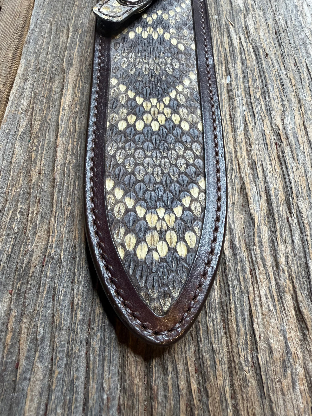Randall Model Clinton Special sheath with an Eastern Diamondback RattleSnake skin from Treeman Sheaths. Hand tooled belt loop, canteen snap. Vibrant colors and one of the hardest skins to source.