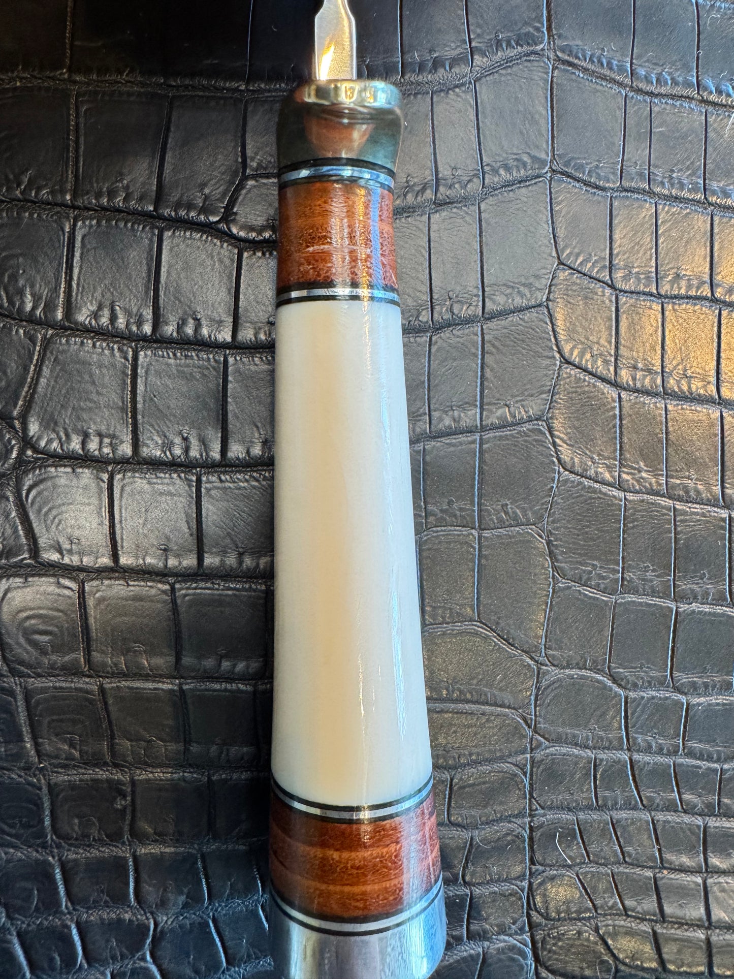 Randall Model 25-6 in Elephant Ivory with stacked Leather, Nickel Silver Hilt and Aluminum Butt cap. Flawless.