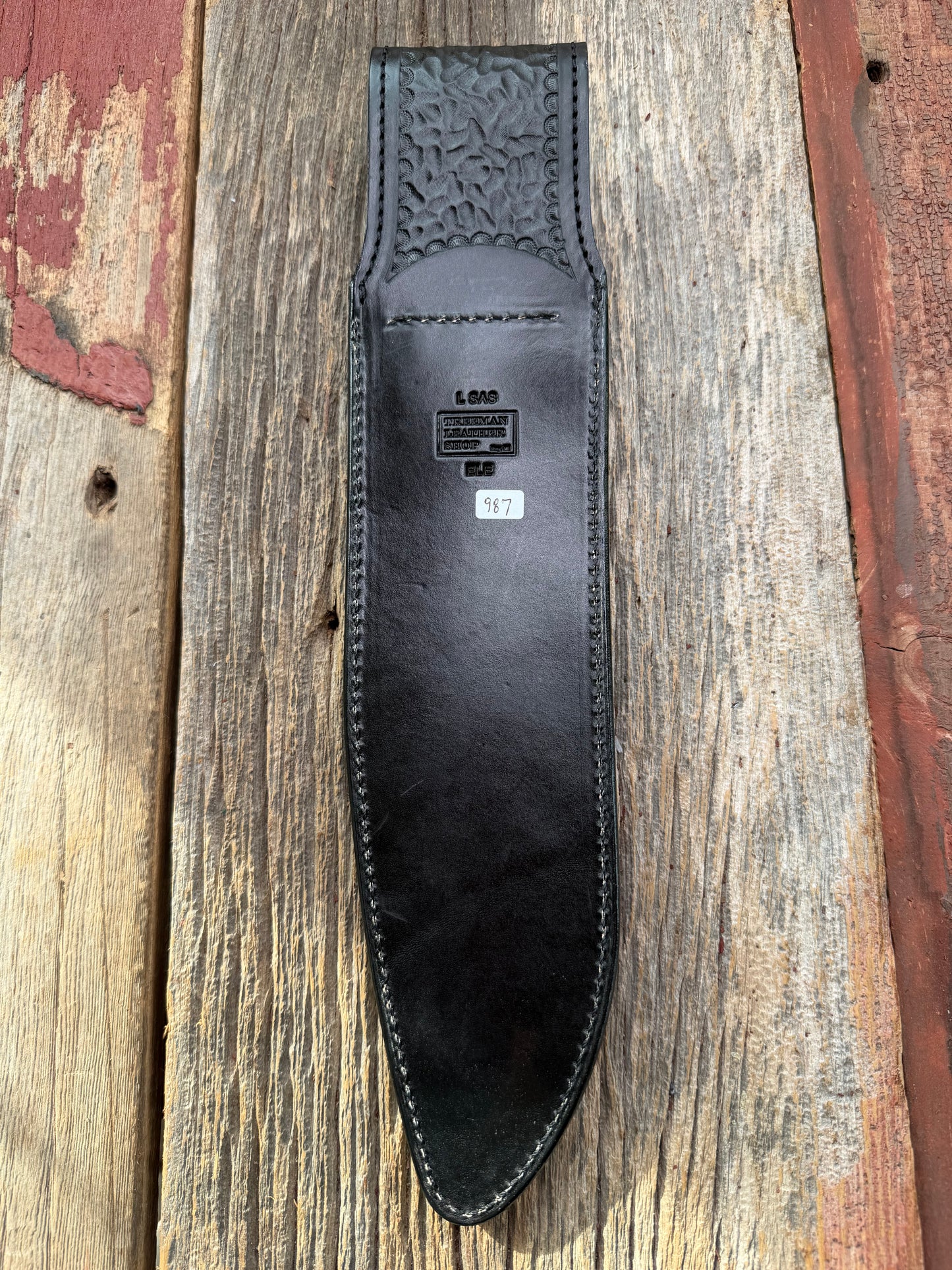 New Randall Model 12-11 Large Sasquatch Sheath in Exotic thick and textured Grey Elephant Hide on black leather from Treeman with a black Canteen snap. Hand tooled belt loop. Killer sheath.