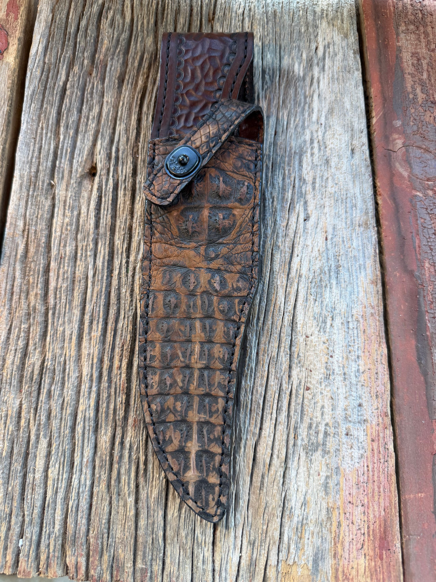 New Randall Model 12-8 Big Bear Sheath in Exotic Dark Brown Sueded Crocodile ( Skull and Hornback) from Treeman with the newest Black Canteen snap.