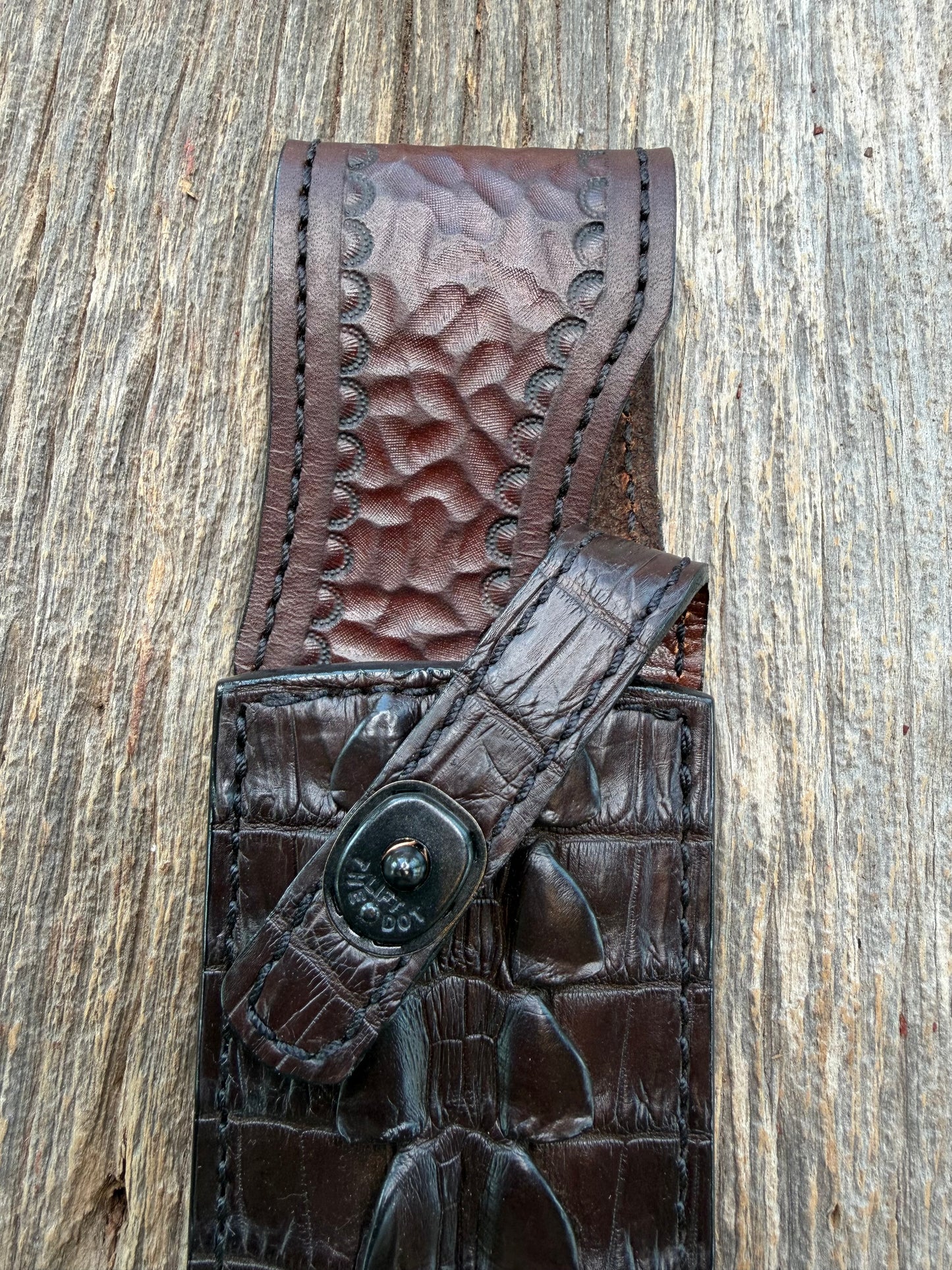 New Randall Model 12-9 Sheath in Exotic Dark Brown Matte Crocodile Tail from Treeman with the newest Black Canteen snap. Killer sheath.