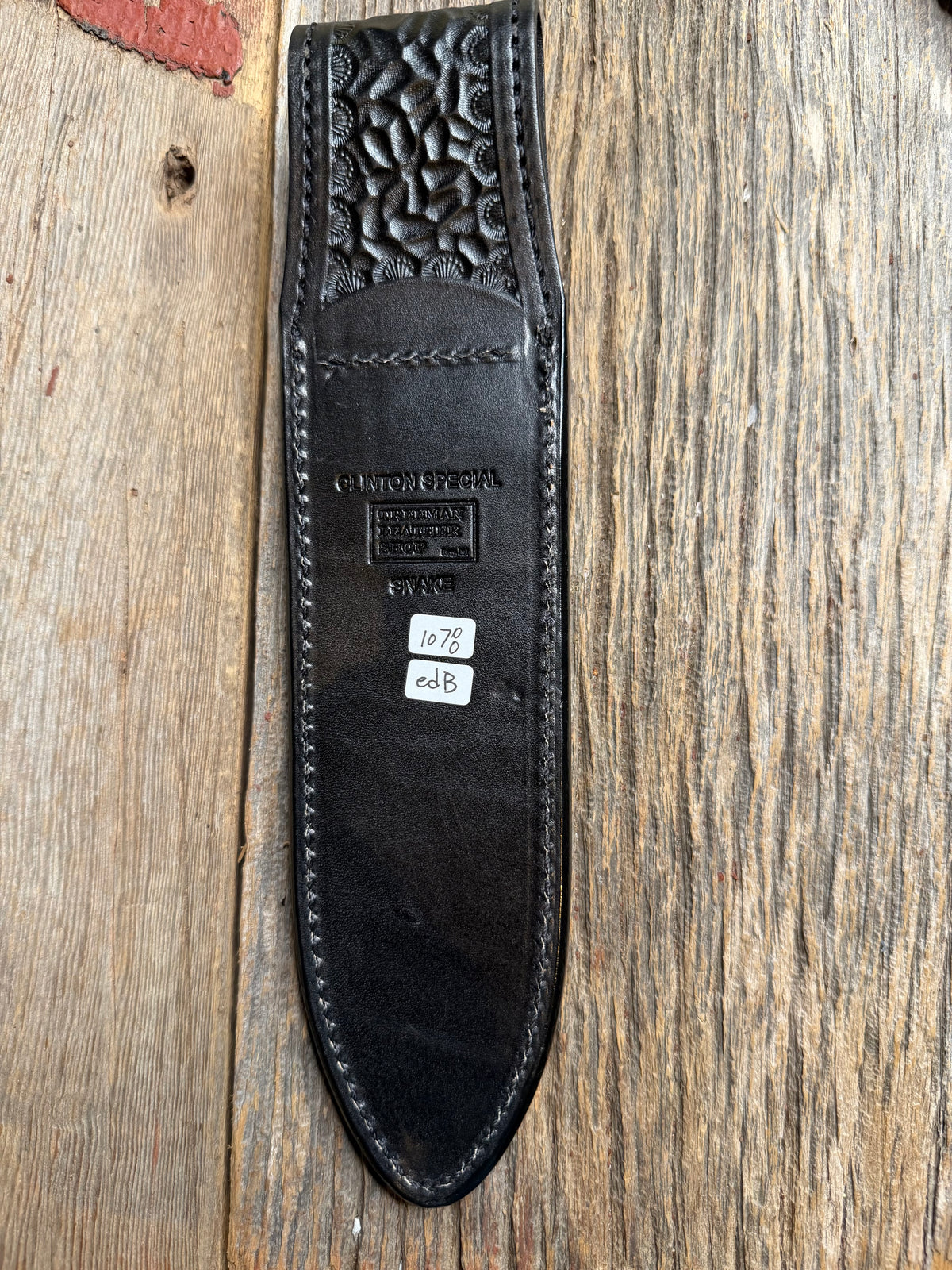 Randall Model Clinton Special sheath with an Eastern Diamondback RattleSnake skin from Treeman Sheaths. Hand tooled belt loop, canteen snap. One the hardest skins to source.