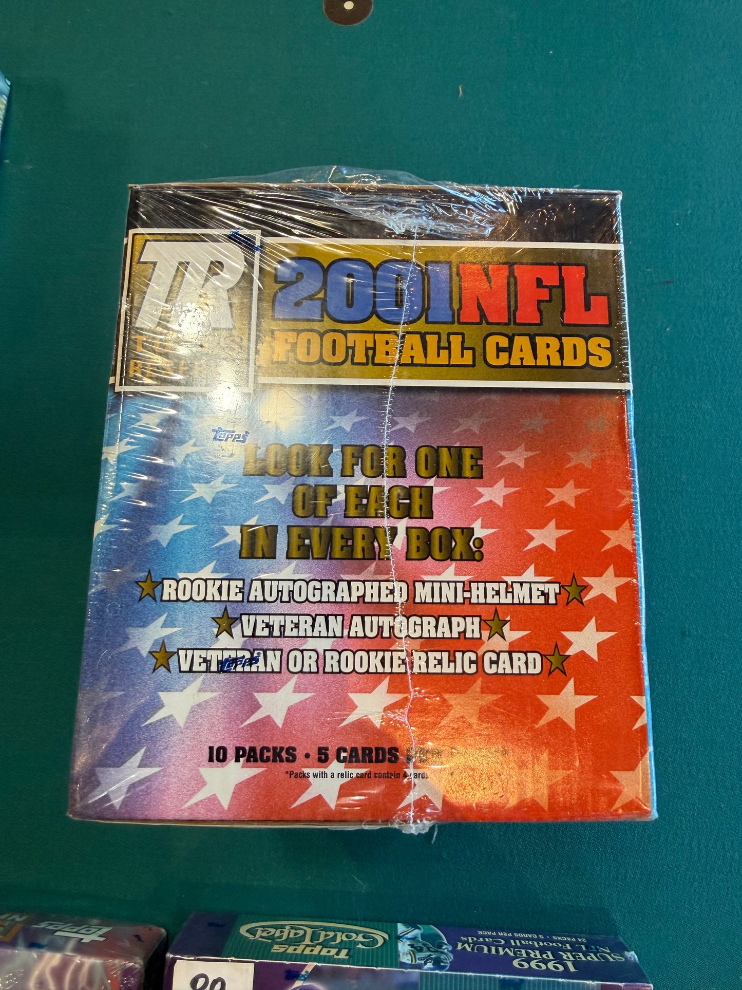 2001 Topps Reserve Football Hobby Unopened Box Drew Brees Rookie Year 10 packs per box, 5 Cards per pack and an autographed Mini Helmet. Rare Box still sealed from 35 years ago.
