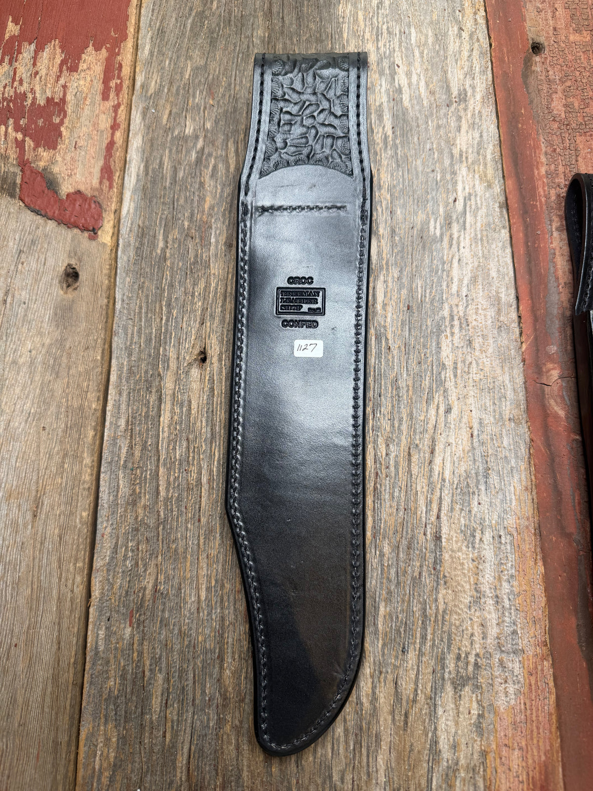 New Randall Model 12-11 Confederate Sheath in Exotic Army Green Matte Anus Crocodile from Treeman with the newest Black Canteen snap. Killer sheath.