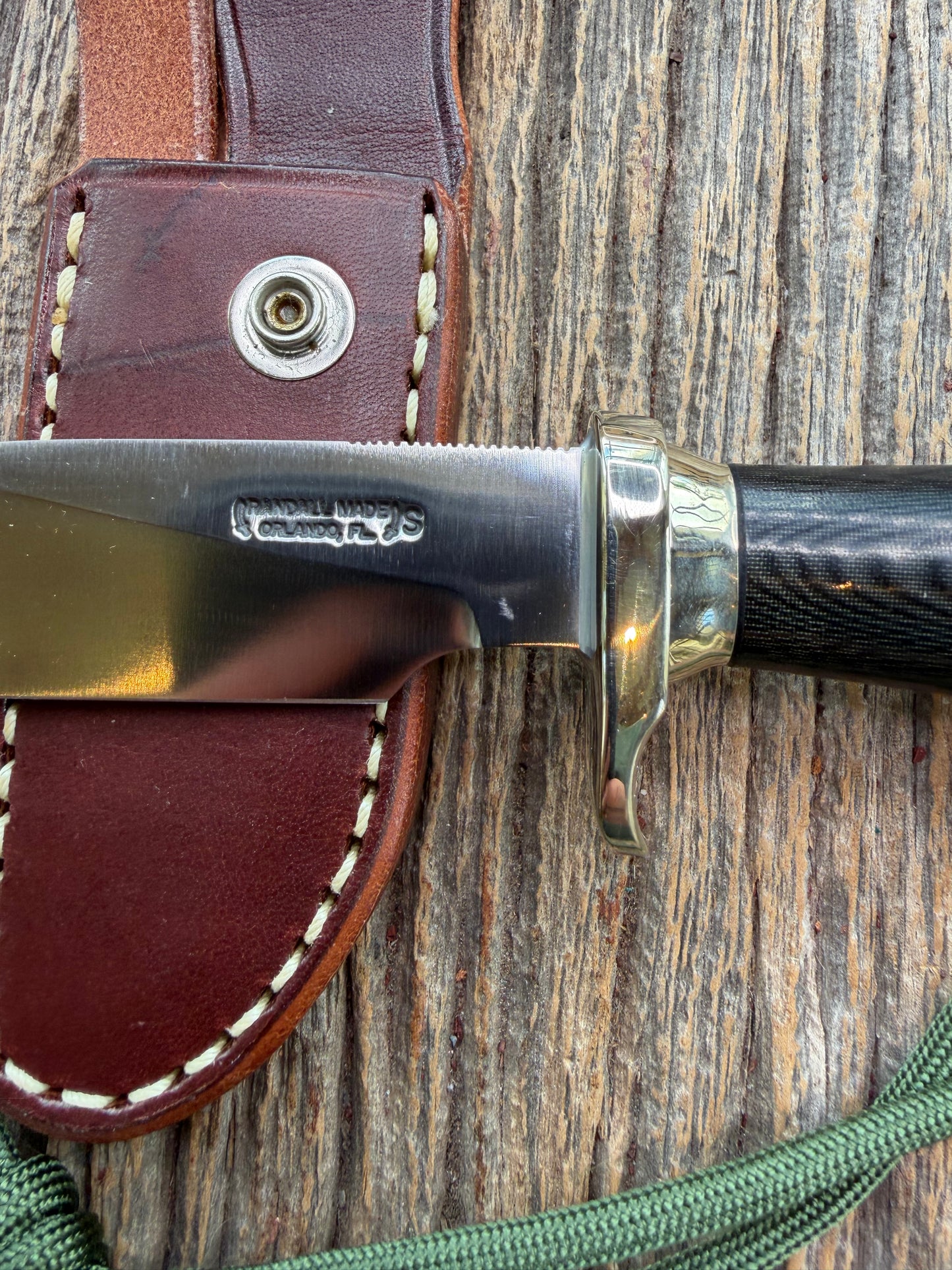 New Randall Non Catalog Model  Cattleman. Black Micarta handle. Nickel silver single hilt and collar. Stainless blade.
